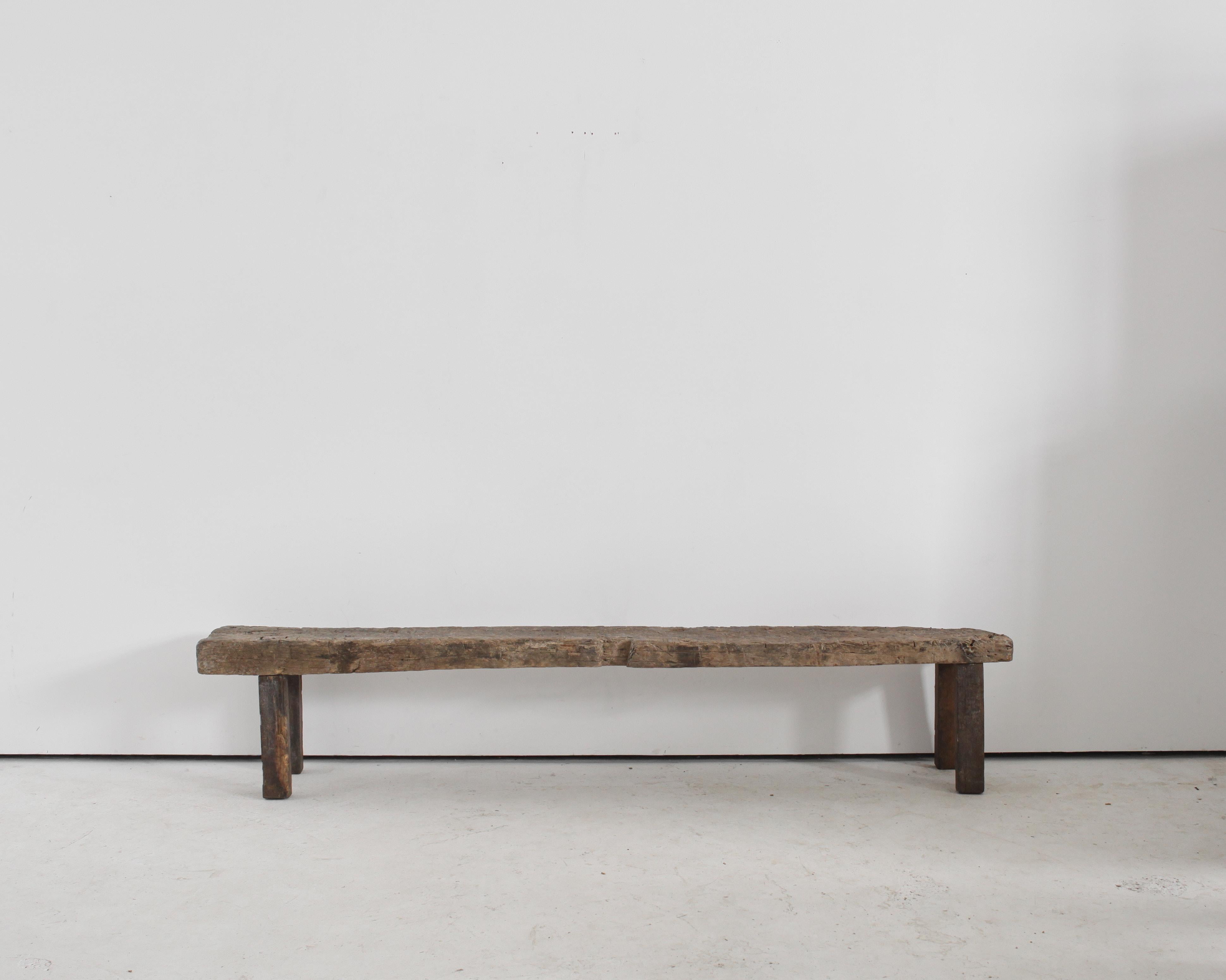 An XL primitive chestnut bench from northern Portgual.

Heavily patinated with many age old repairs.