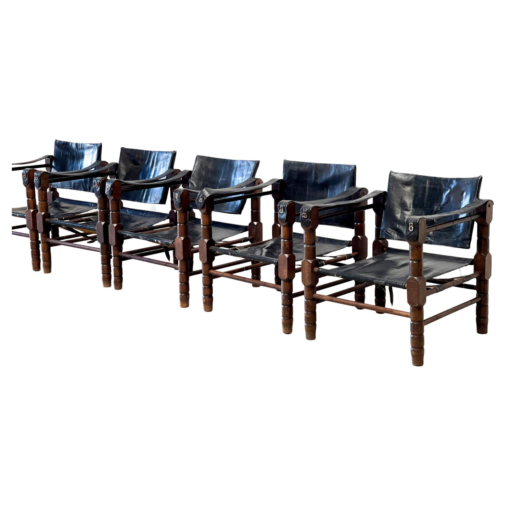 XL set Safari chairs
Beautifully patinated safari chairs. It is exceptional to see a set of 5 the same safari chairs with the same patina. These have a beautiful black leather seat and back. We are not sure about who made these chairs. But they are