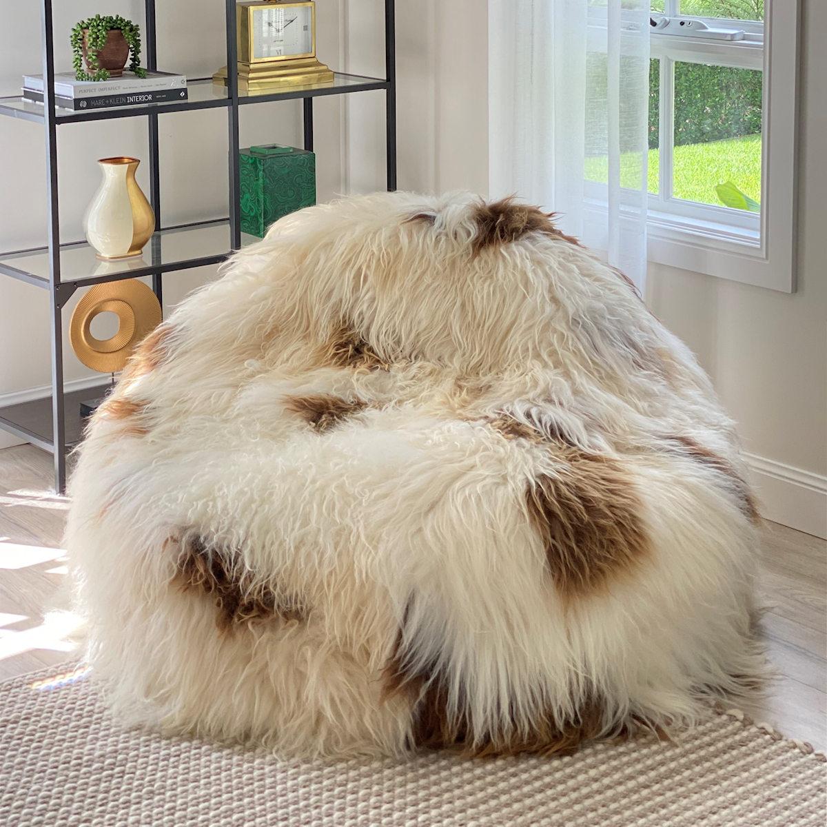 Imagine relaxing into this designer, shaggy sheepskin beanbag while unwinding after a long and tiring day. This extra large and enchanting shaggy bean bag is currently available only as limited edition piece with only 2 available of its kind. Each