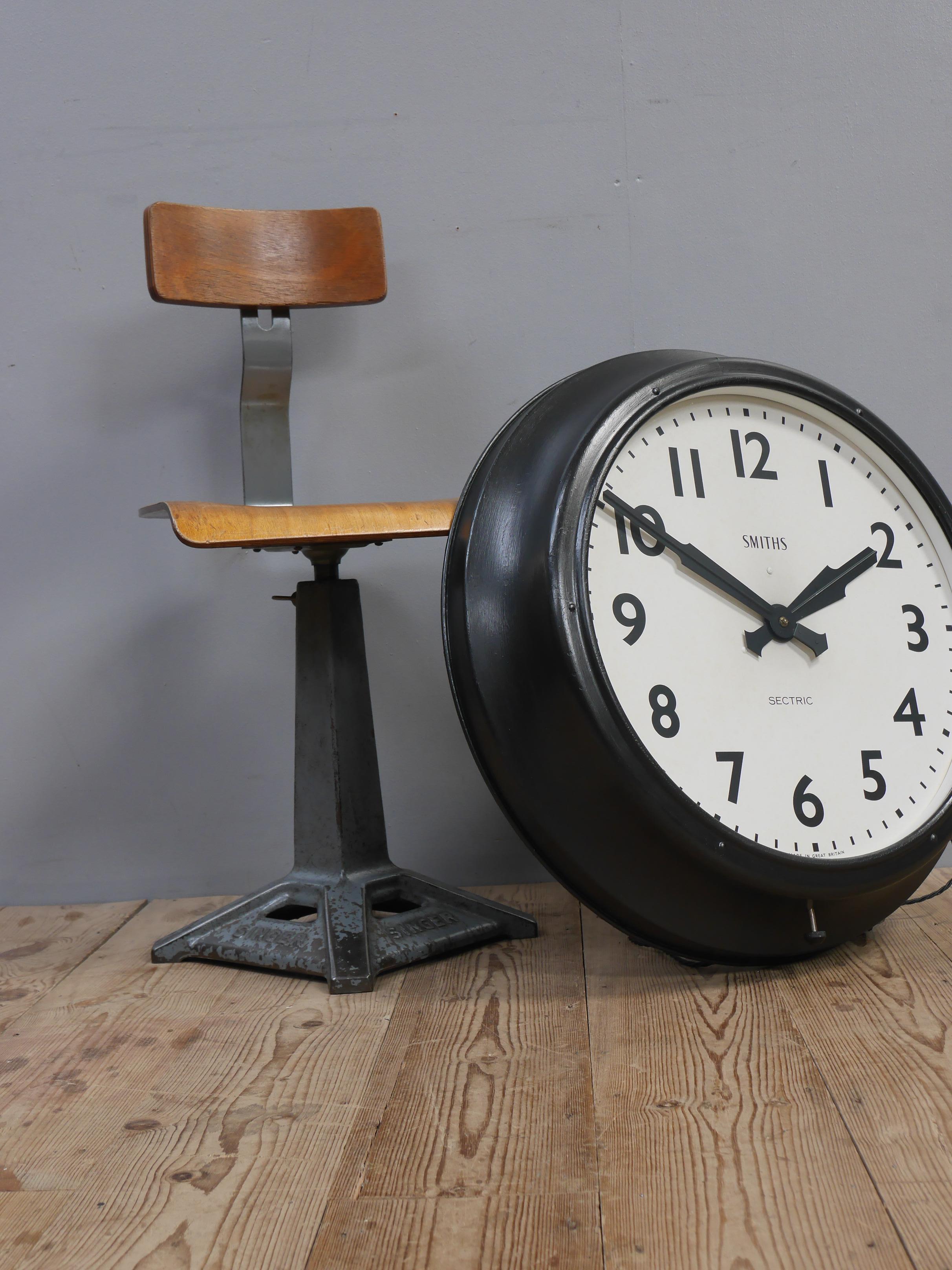 An extra large industrial factory clock by Smiths.
A fantastic & increasingly hard to come by model by this iconic clock maker, Smiths of Great Britain. 
With a crisp clear face retaining it's original, unmistakable hands & Smiths branding and