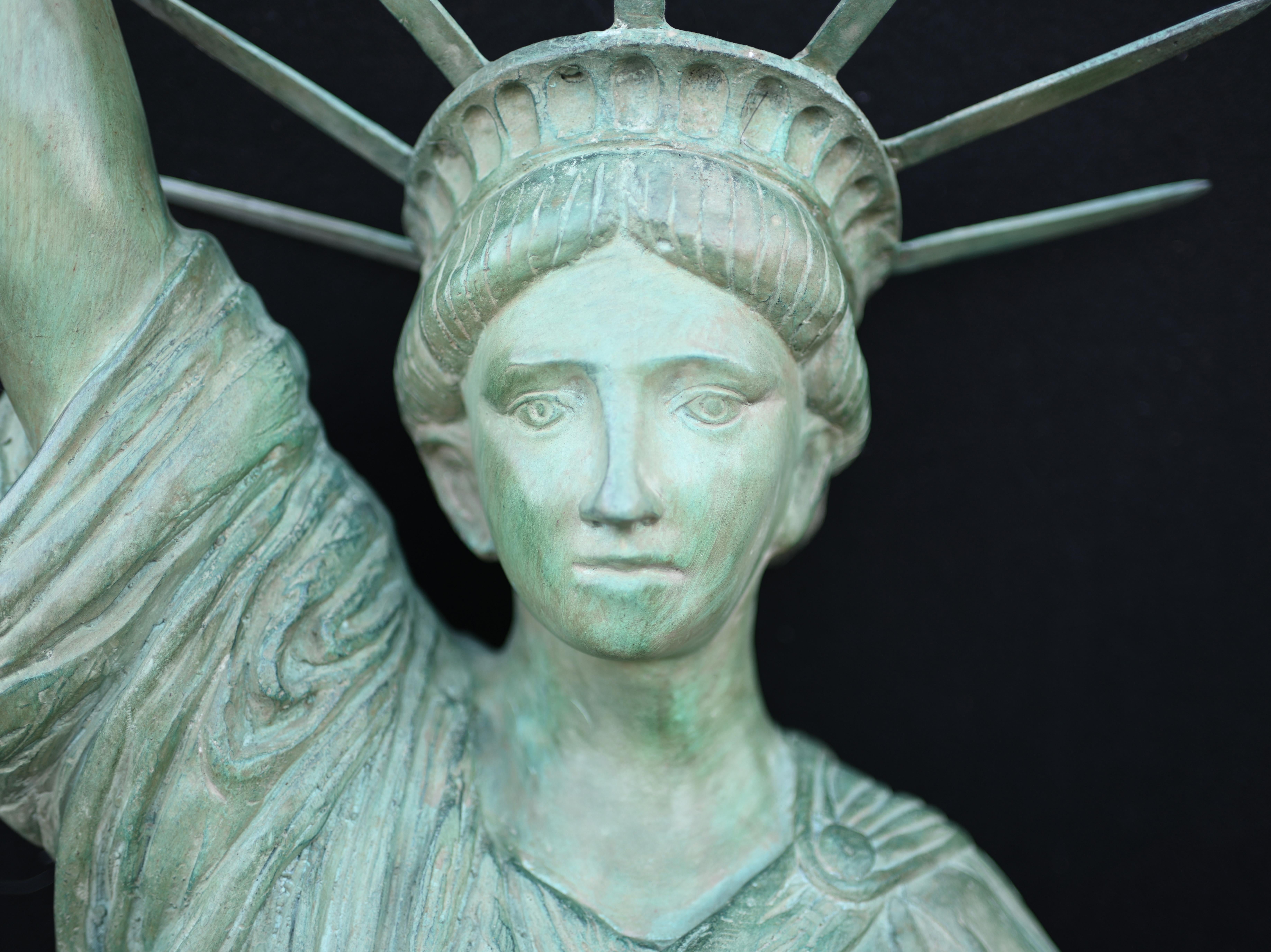 Wonderful bronze casting of the Statue of Liberty
One of the most famous statues which also functions as a light
Good size at over six feet tall - 200 cm
Love the verdis gris patina
This is pre-wired with a European plug, can be adapted for