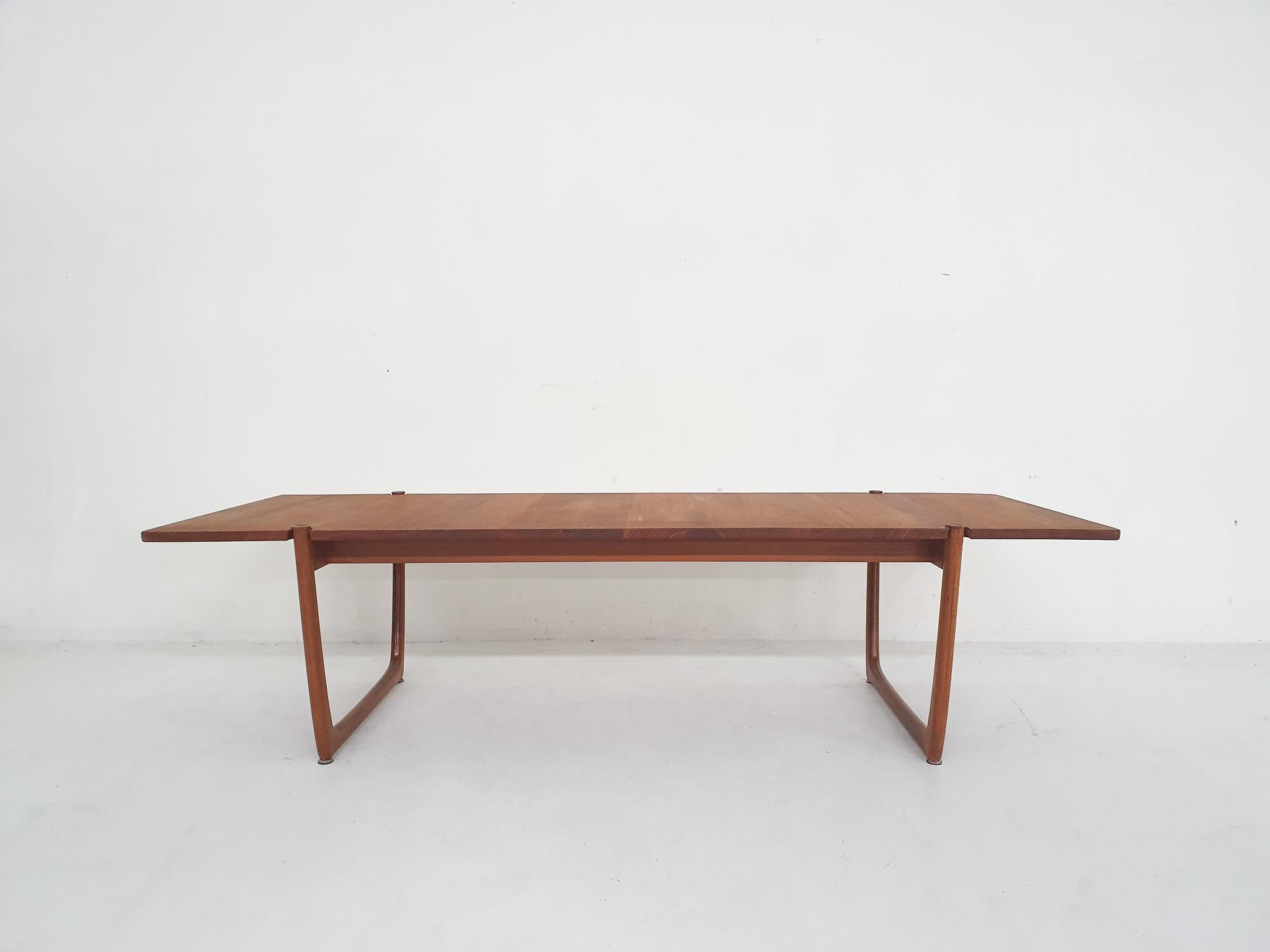 Large coffee table 175cm(!) in teak veneer by Peter Hvidt and Orla Molgaard Nielsen for France and Son. Marked with a tag under the table.
We have refinshed the top.

Peter Hvidt was a Danish architect and furniture designer. He co-founded the