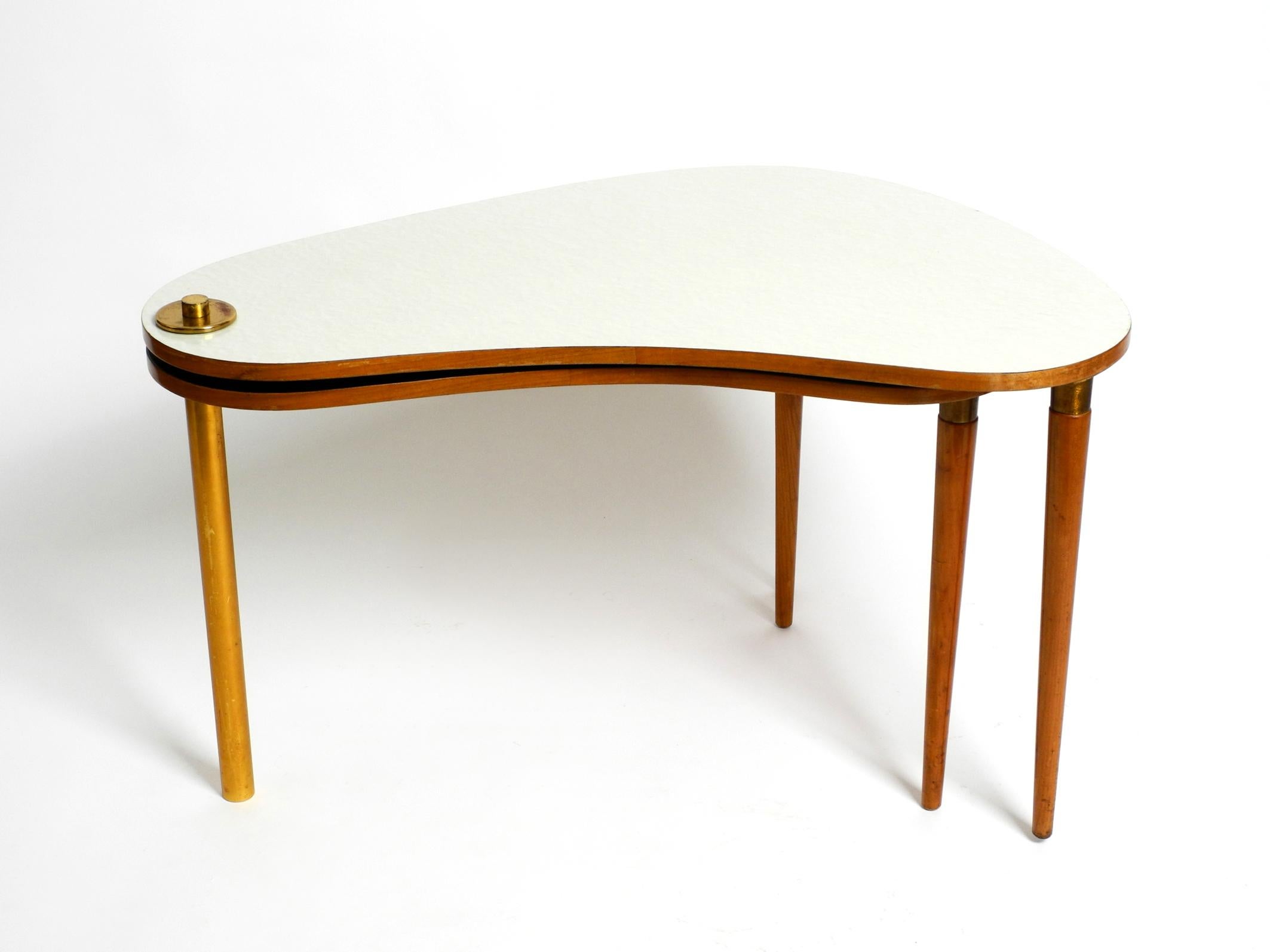 Mid-20th Century Xl Three-Legged Midcentury Kidney Side Table Consisting of Two Twistable Tables