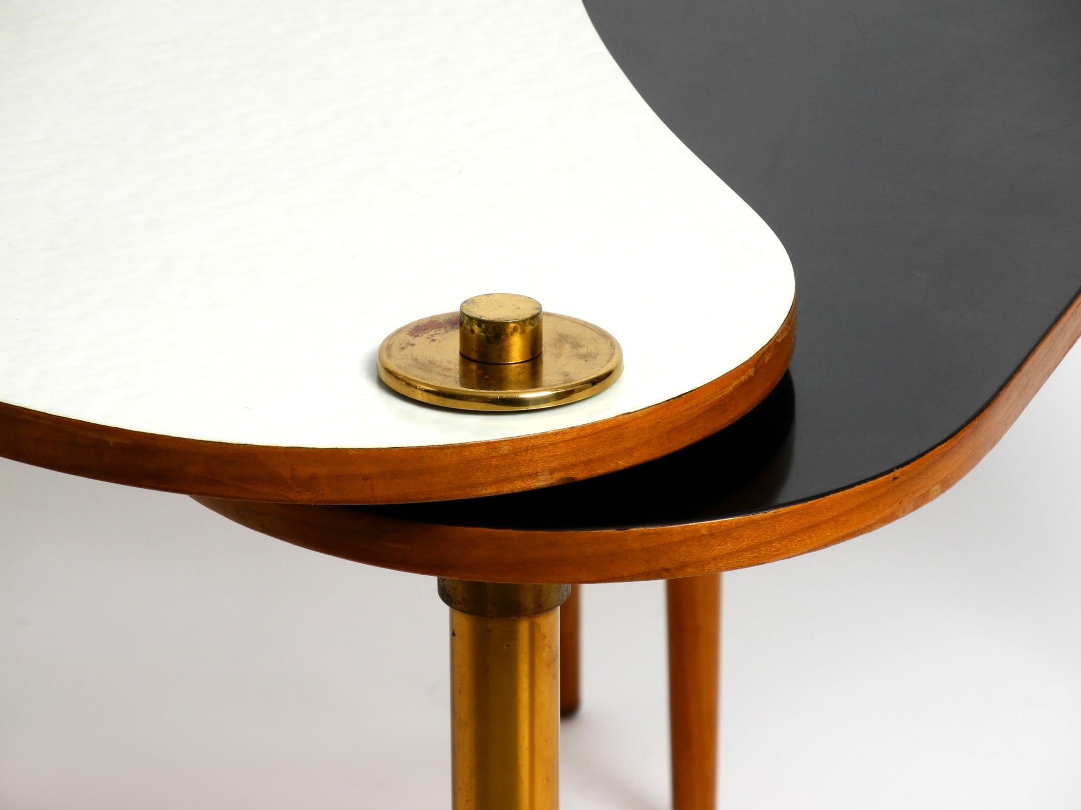 Brass Xl Three-Legged Midcentury Kidney Side Table Consisting of Two Twistable Tables