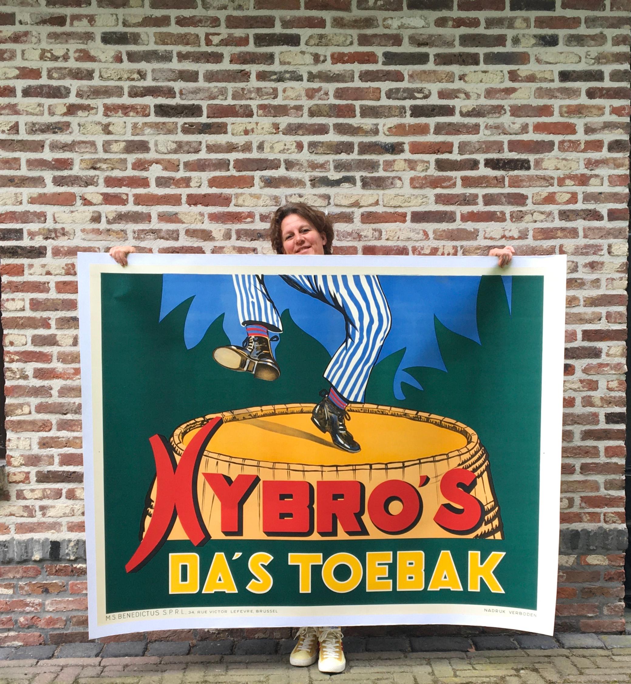 XL tobacco poster for Nybro's tobacco Belgium.
With the slogan: Nybro's that is tobacco ! 
A very large litho poster in the beautiful colors 
green, bright blue, yellow and red. 
You see a large barrel, with a dancing pair of legs, dressed in a blue