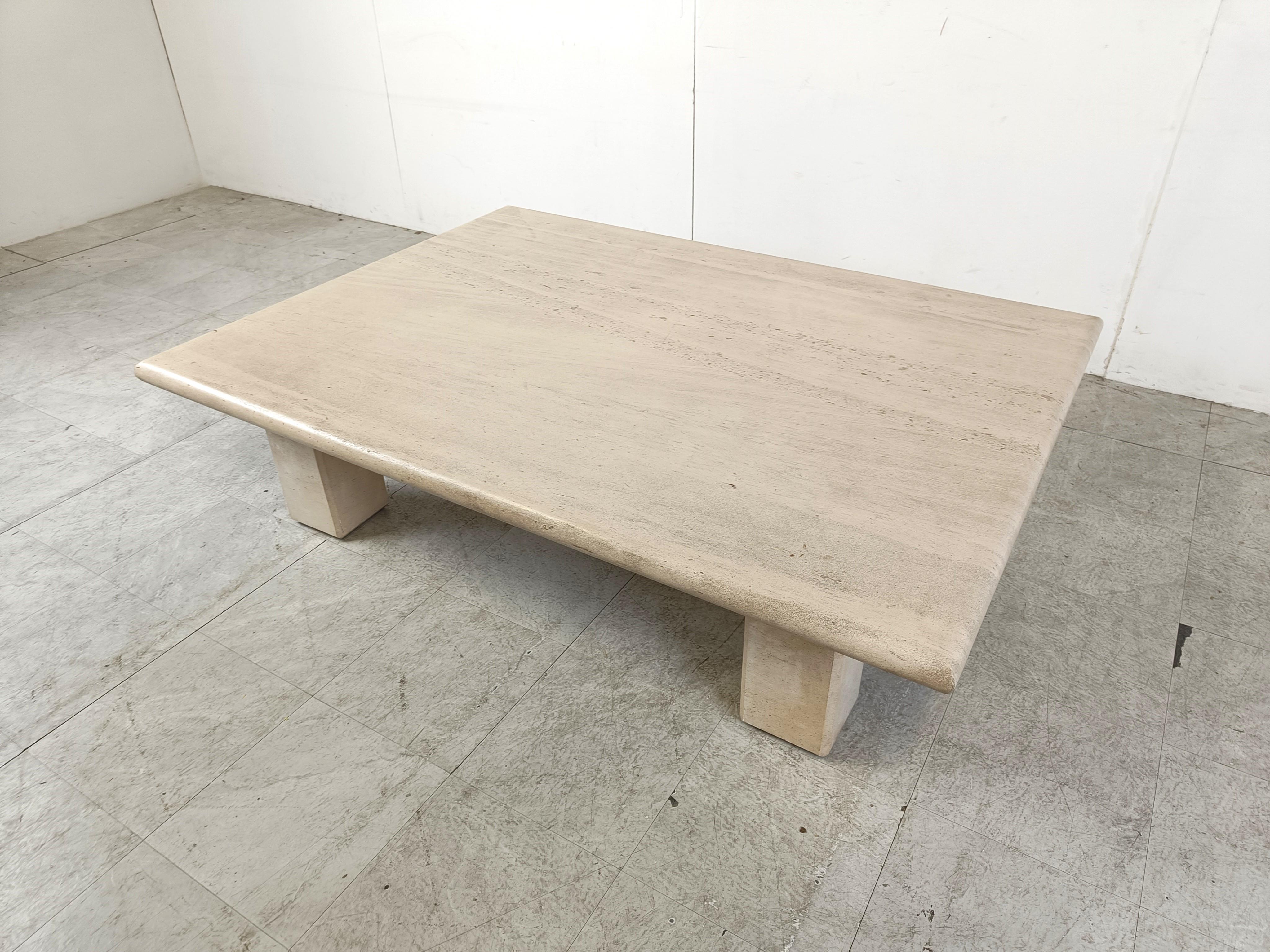 Vintage large rectangular travertine coffee table with four legs.

Beautiful natural travertine stone.

The table top is very very thick and incredibly heavy, but a real statement piece.

Good condition

1970s - Italy

Height: 40cm/15.74