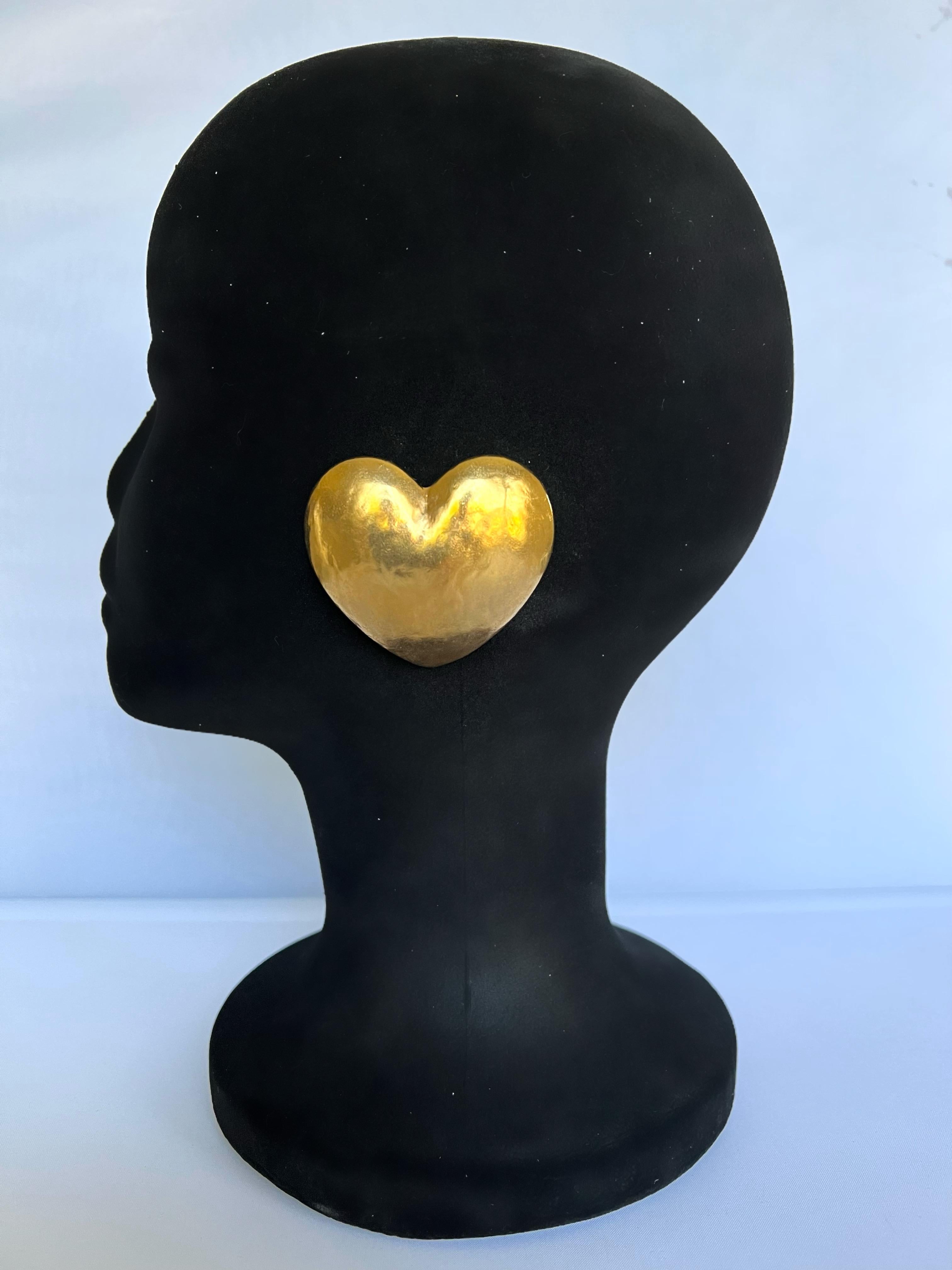 XL vintage gilt metal heart clip-on earrings by Robert Goossens for Yves Saint Laurent, circa 1980s. 
