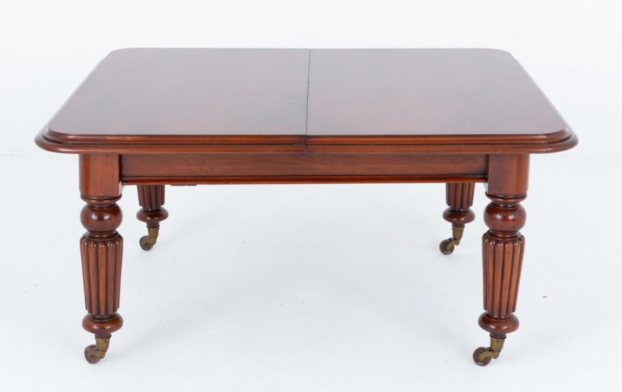 William IV mahogany 3 leaf extending dining table
Period 19th Century antique
This dining table is raised upon ring turned and fluted legs which retain their original brass and porcelain castors
If you are looking for dining chairs to match the