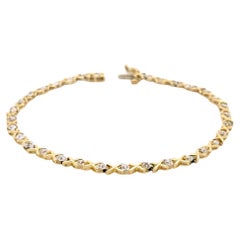 XO Bracelet tennis bicolore en or 10 carats avec diamants 0,15 carat
