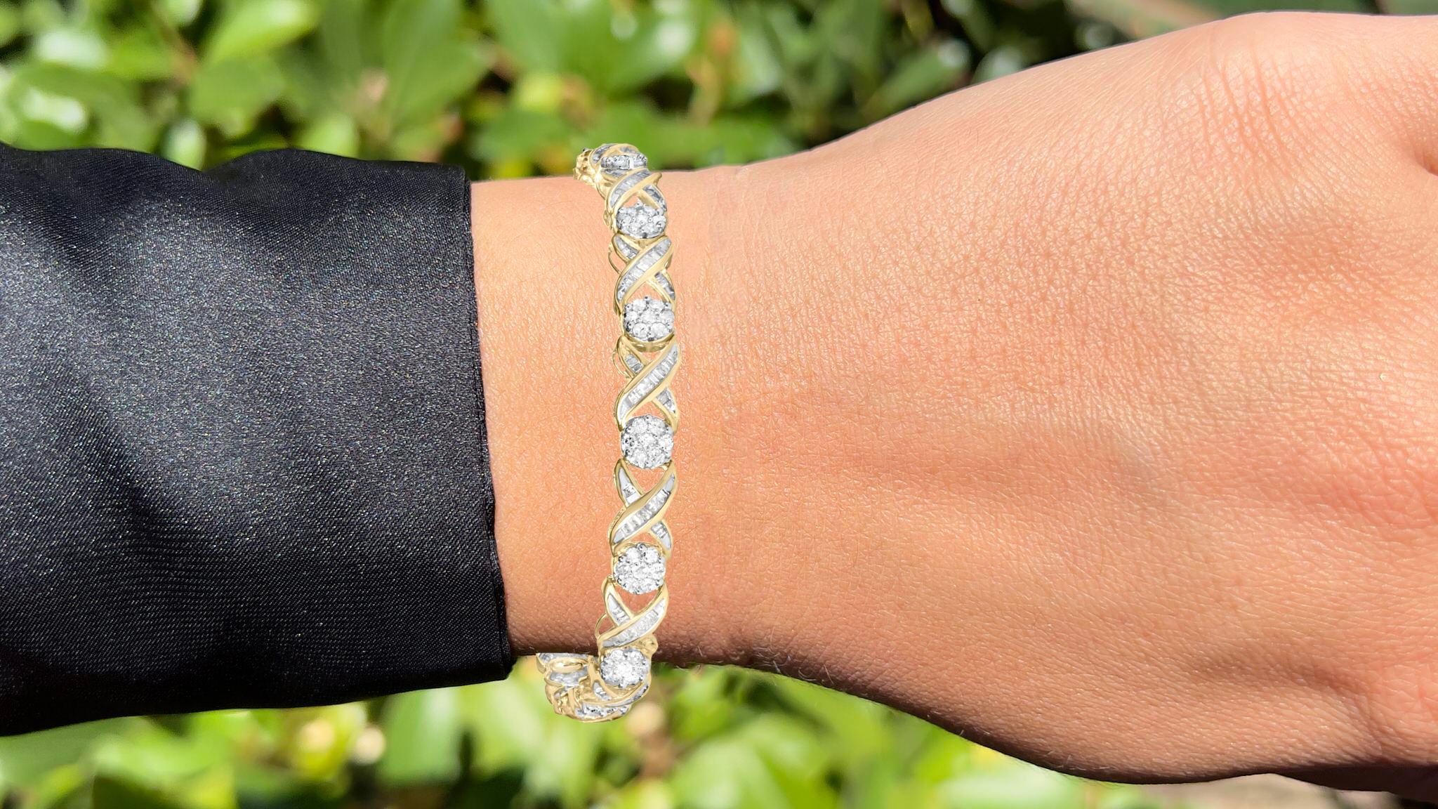 Es kommt mit dem Gemmologischen Gutachten von GIA GG/AJP
Alle Edelsteine sind natürlich
255 Diamanten = 3,05 Karat
Schliff: Rund, Baguette
Metall: 10K Gelbgold
Länge: 7,5 Zoll
Breite: 0,2 Zoll