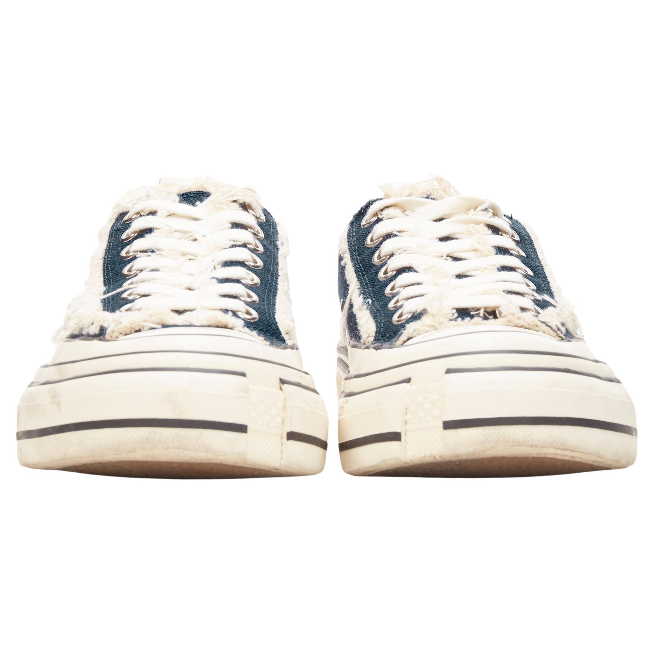 XVESSEL G.O.P. Lows blue denim deconstructed distressed sneakers EU37 US7
Brand: XVessel
Model: GOP Lows
Material: Denim
Color: Blue
Pattern: Solid
Closure: Lace Up

CONDITION:
Condition: Very good, this item was pre-owned and is in very good