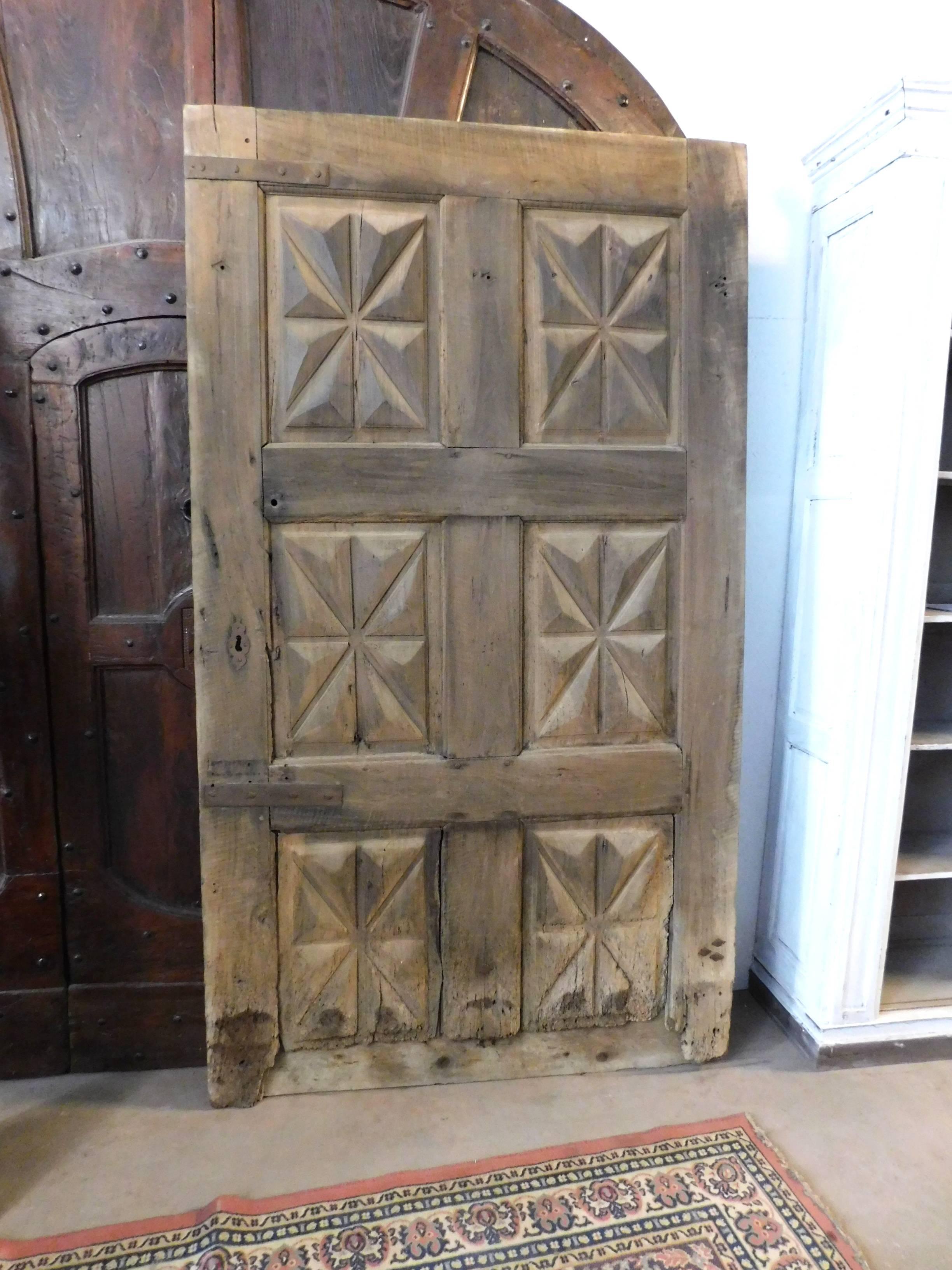 17th century entry door made of walnut.