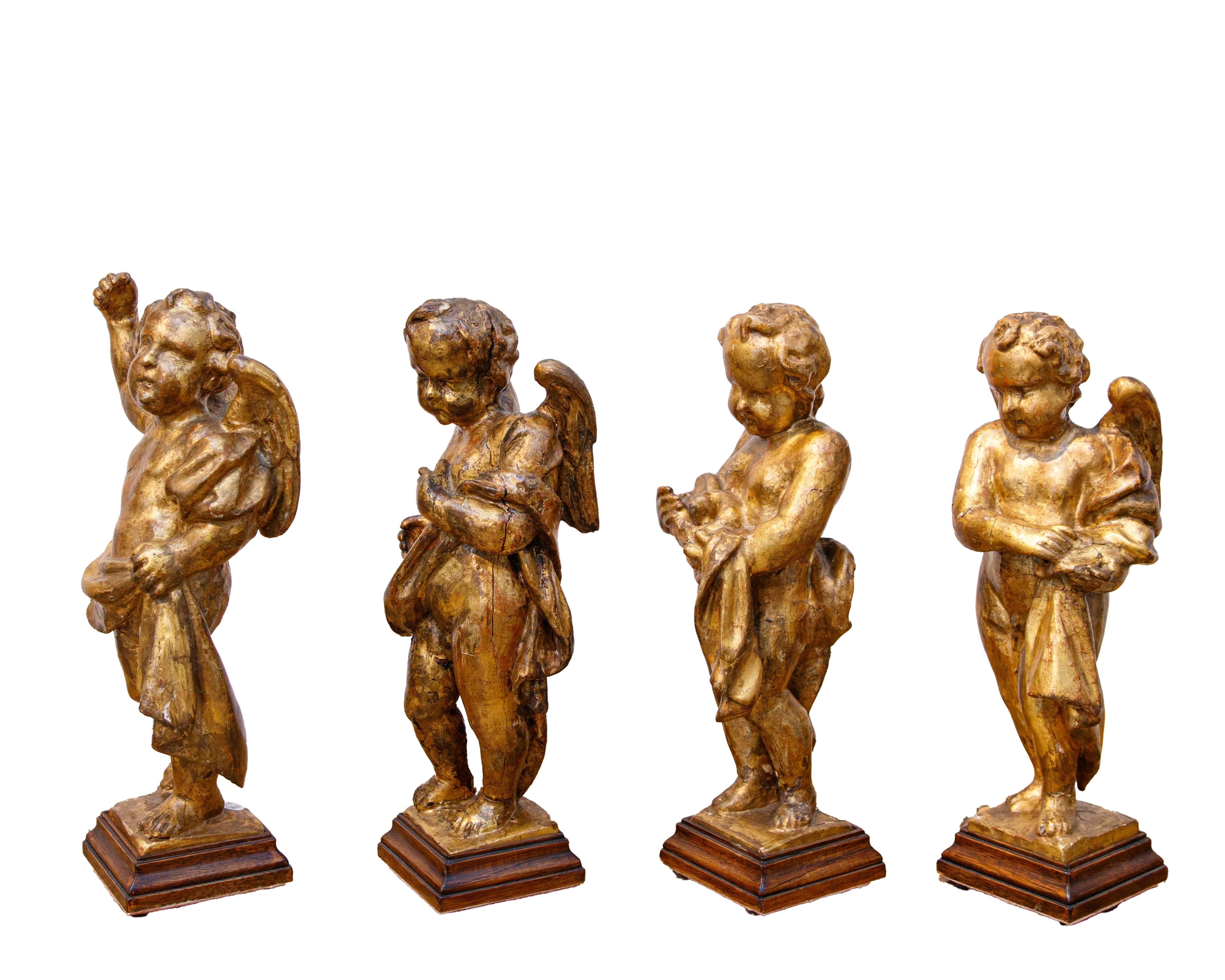 Siglo XVII

Cuatro putti

Madera dorada,cm h 33