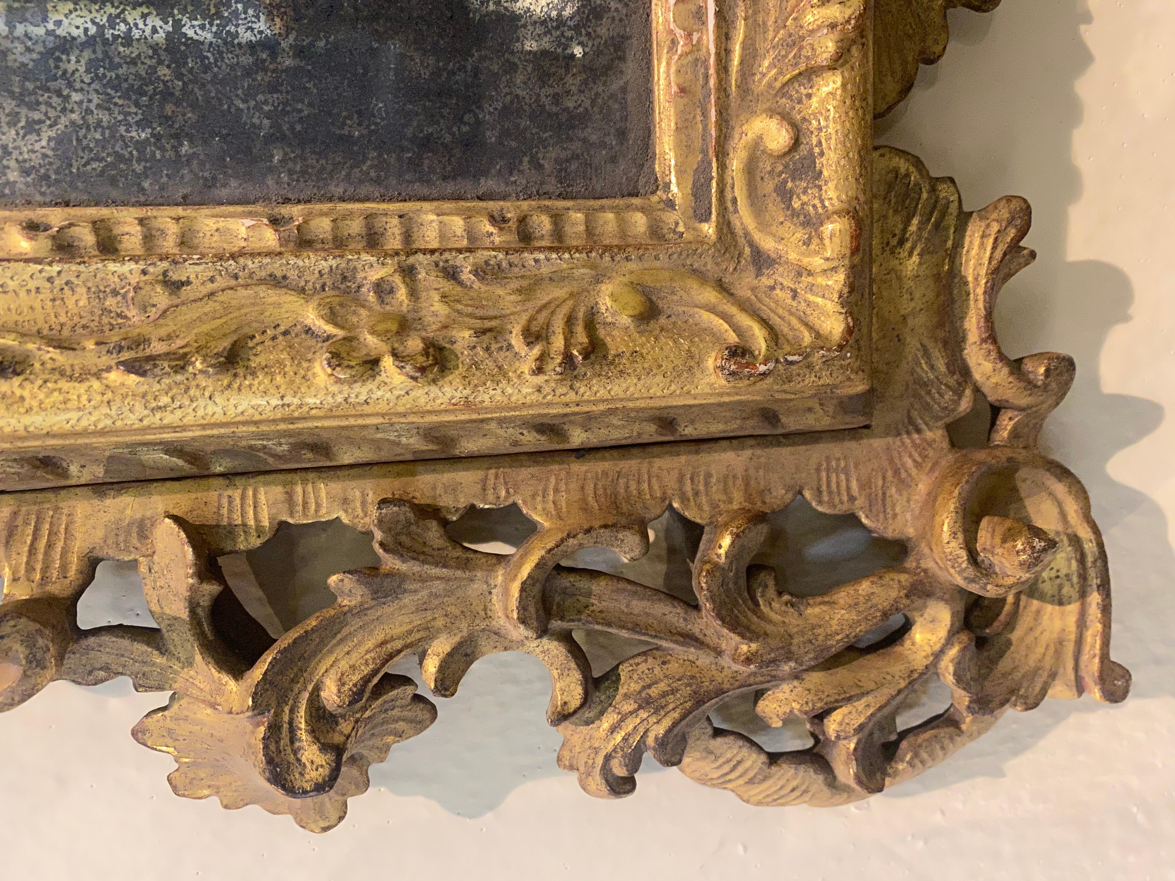 Rococo 18th Century Carved and Gilded Mirror For Sale
