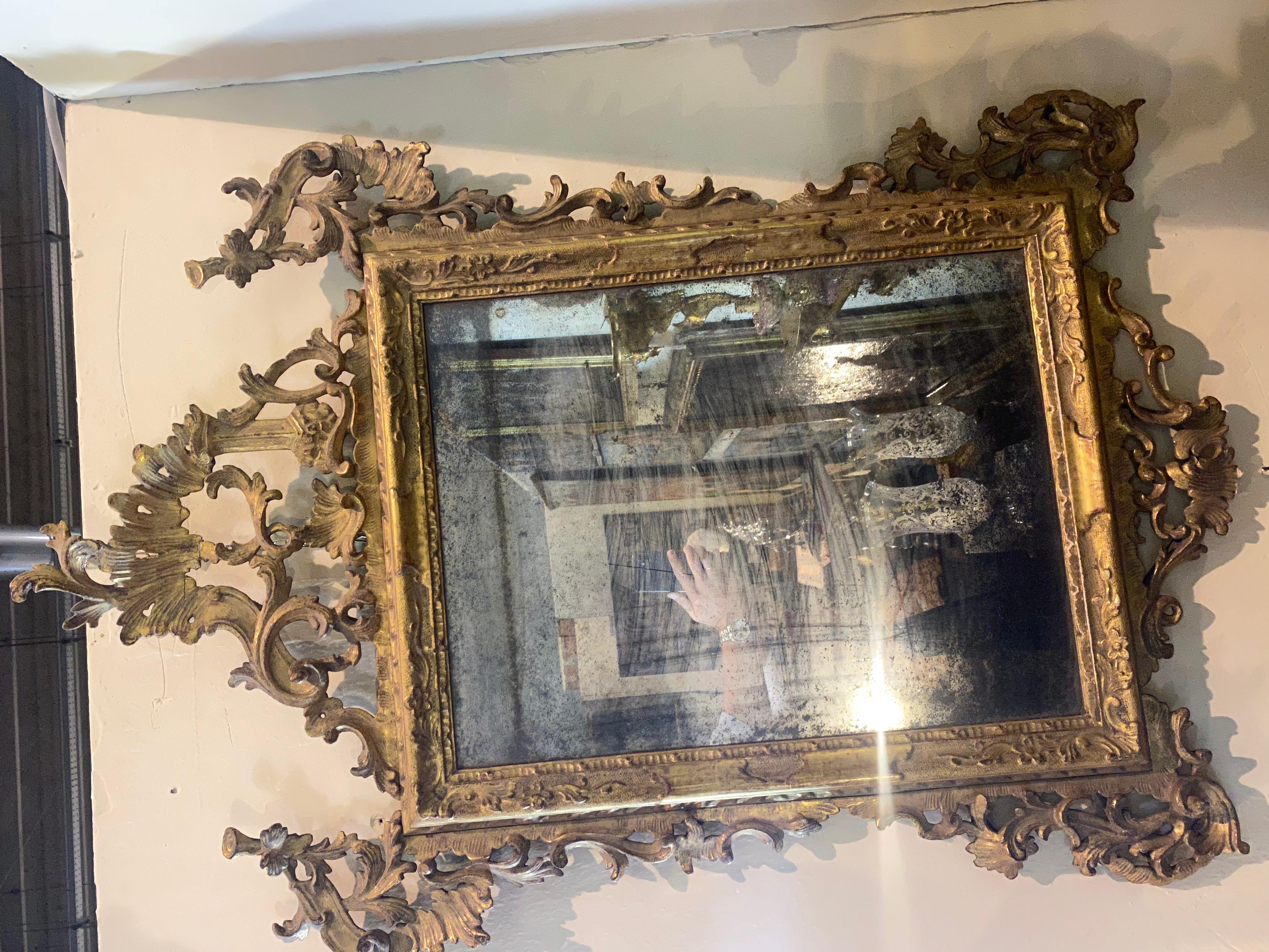 Gold 18th Century Carved and Gilded Mirror For Sale