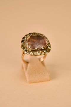 Anello portoghese in oro e argento del XVIII secolo con ametista e crisolito
