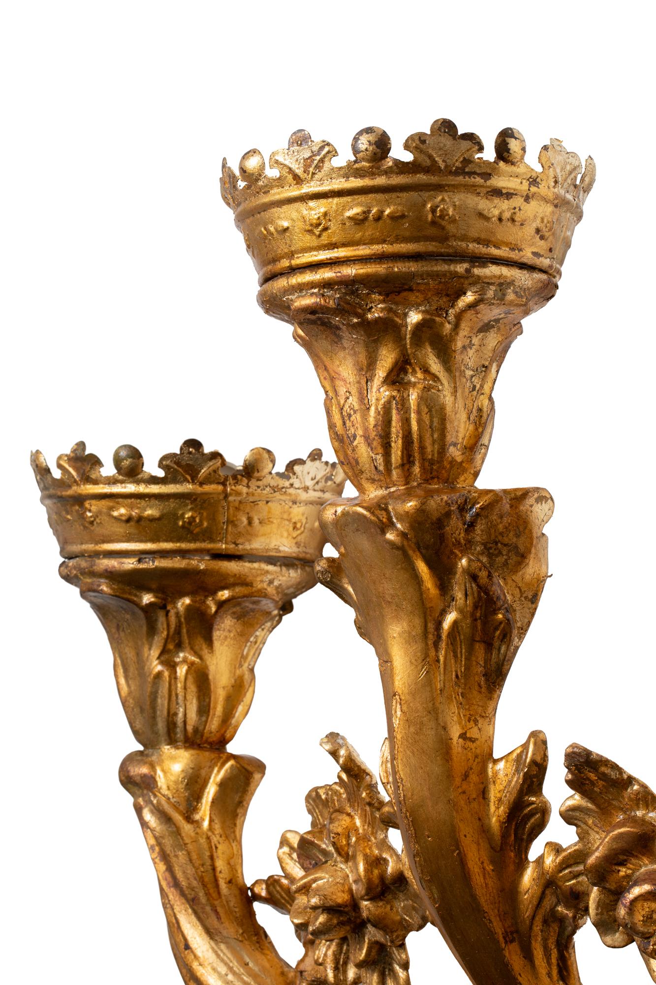 XVIII Century Pair of Touchers in Gilt Woodwork Converted in Lighting Appliqués

Carved and gilded wood touchers from XVIII century Spain are exquisite examples of craftsmanship and artistic flair characteristic of the Baroque and Rococo periods.