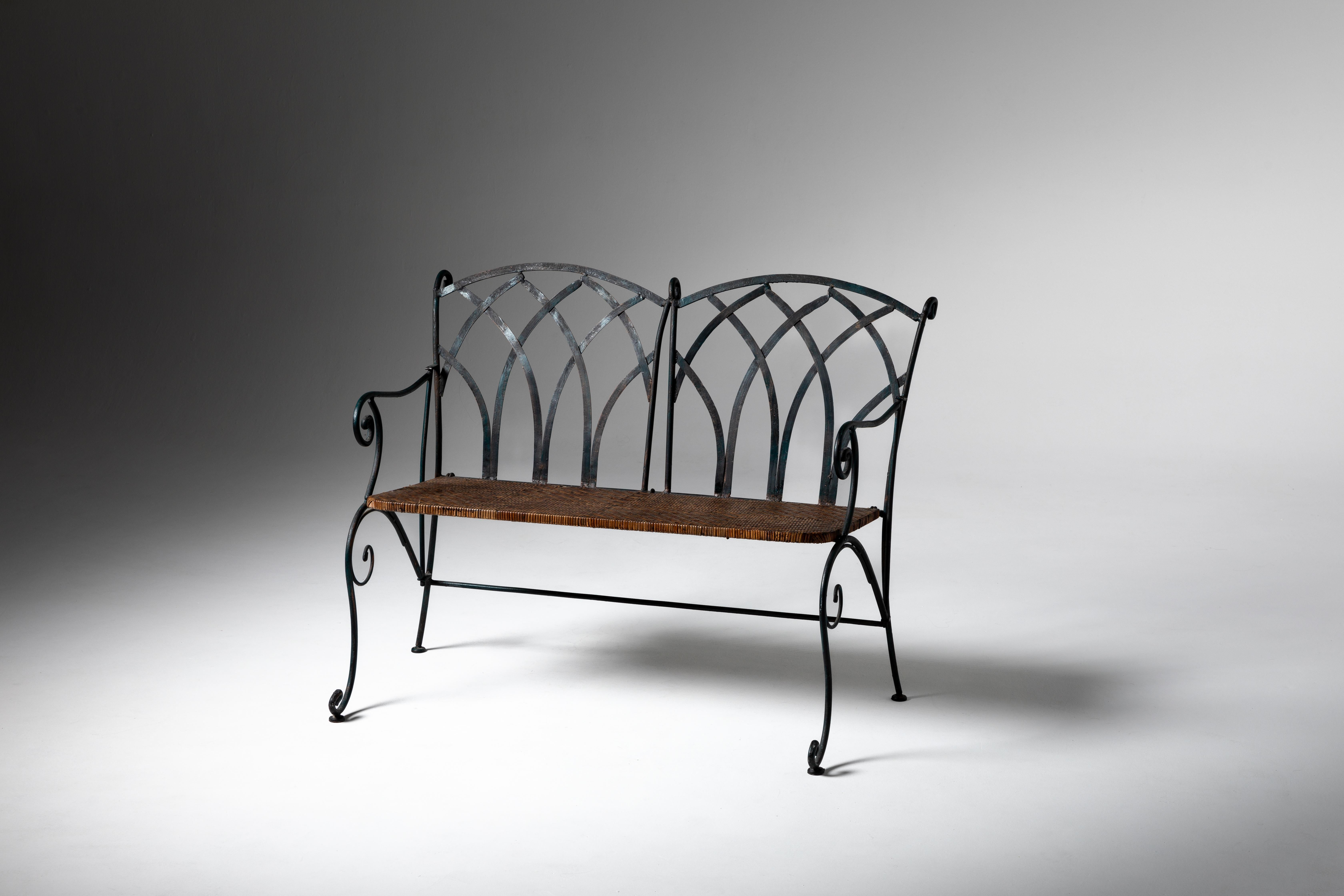 French garden benches made from iron and straw are a charming and rustic variation of traditional garden benches. These benches typically feature a sturdy iron frame for durability and stability, combined with a seat and sometimes a backrest made