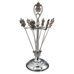 Plata maciza 800 italiana del siglo XX  Seis pasadores Pickle y soporte