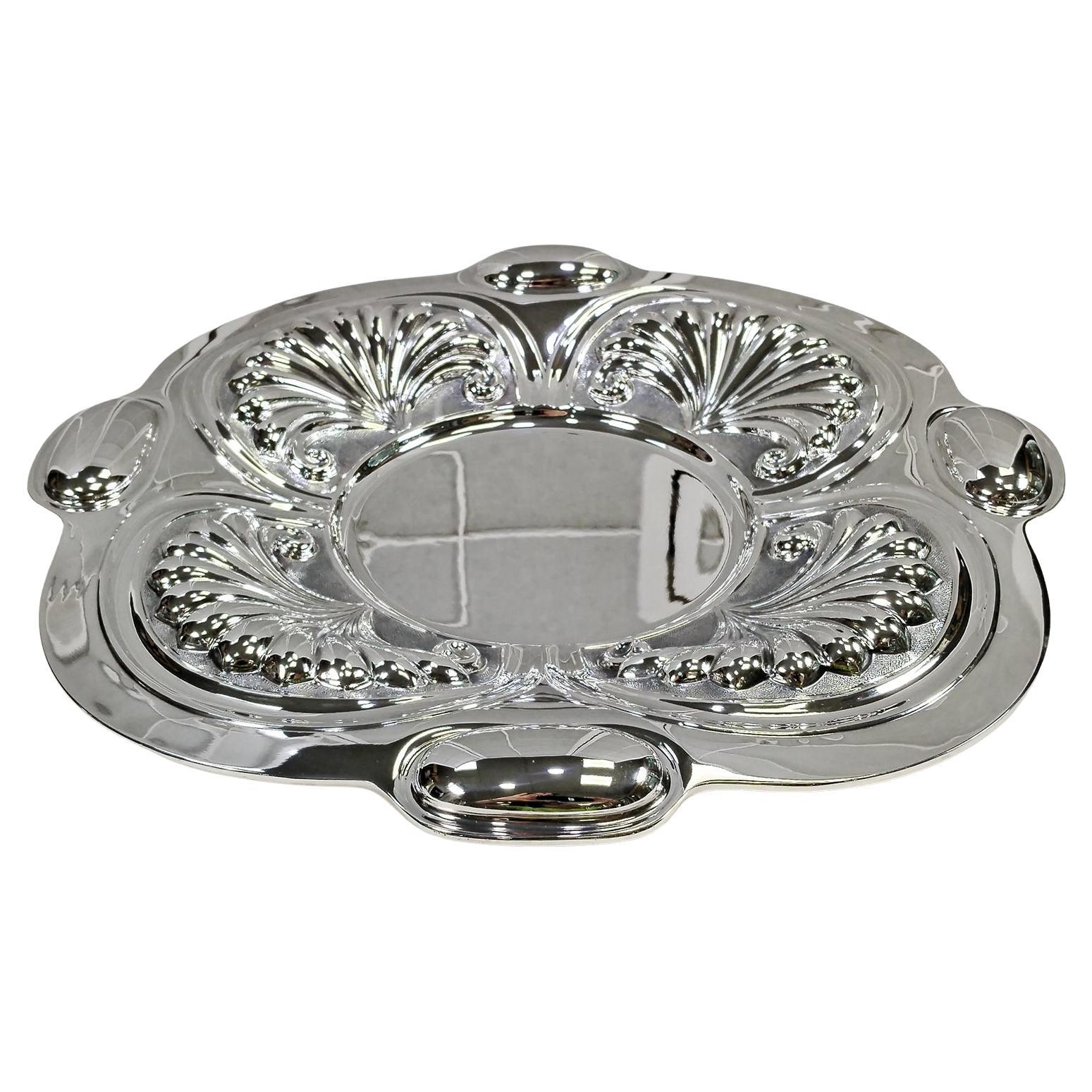 Centro de mesa italiano del siglo XX en plata de ley con conchas en venta