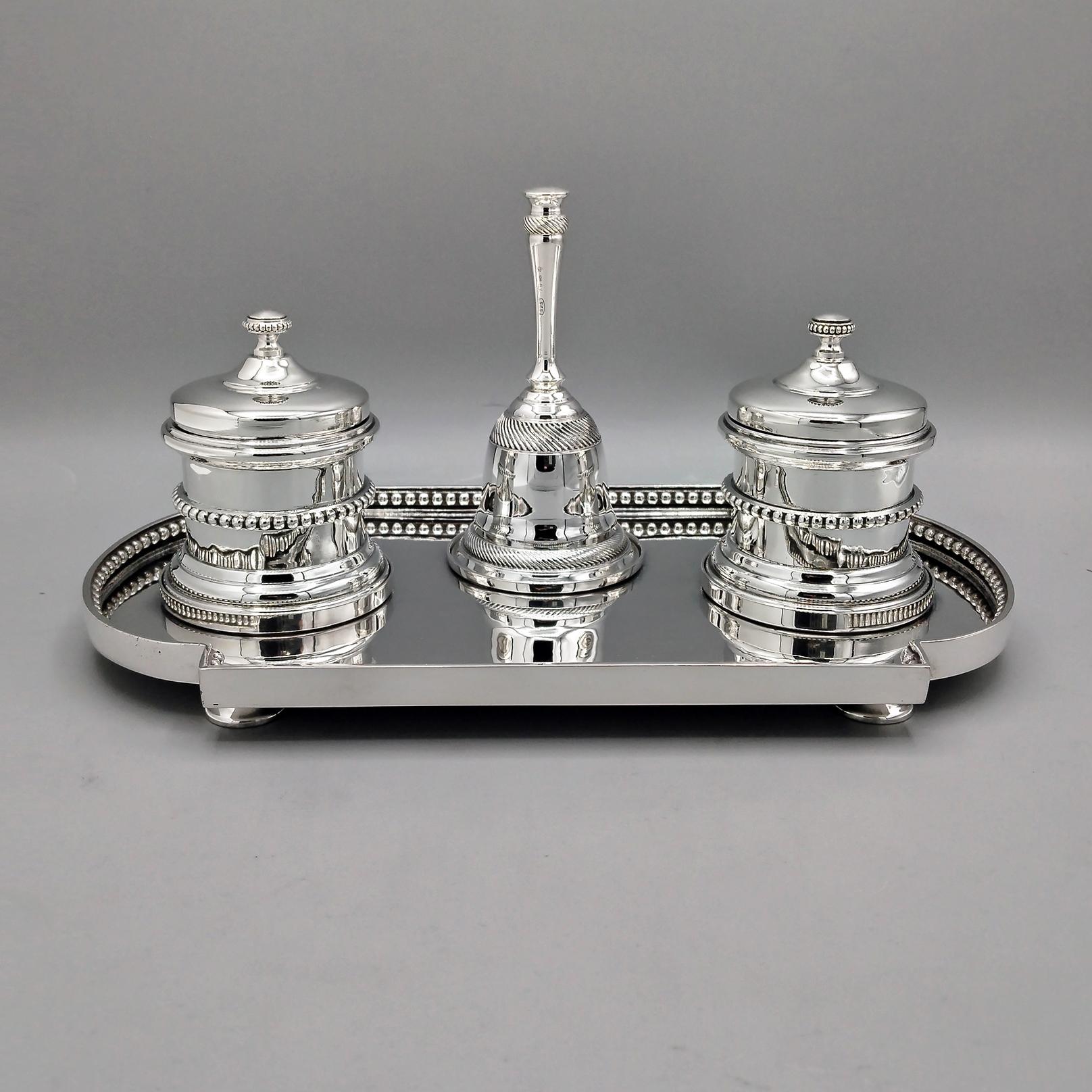 925 sterling silver inkwell in the shape of a cathedral.
The tray plate has been completely hand-hammered from a raw 925 silver plate.
The inkwell is raised from the support surface by 4 round feet.
A beaded border has been soldered around the
