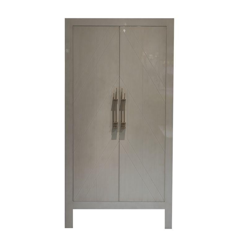 XXI century design cabinet
It is made of lacquered wood and steel handles.
Measures: 110 L x 45 W x 215 H CM.