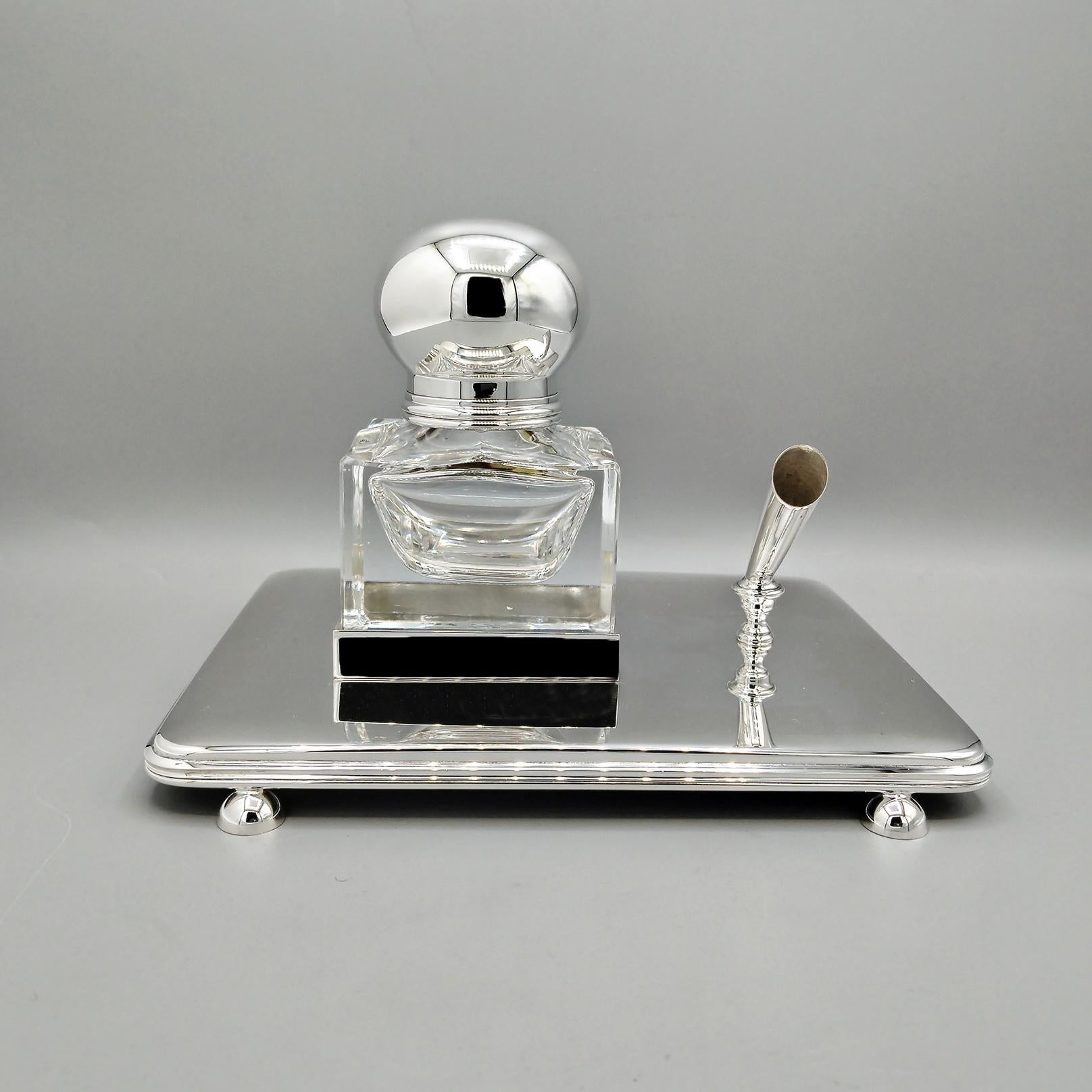 Modern style sterling silver inkwell.
The inkwell was made from a raw sheet of 925 silver and hand-shaped to form a slightly rounded rectangle.
A double-line border was soldered on the outer edge both for finishing and to strengthen the object.
Four