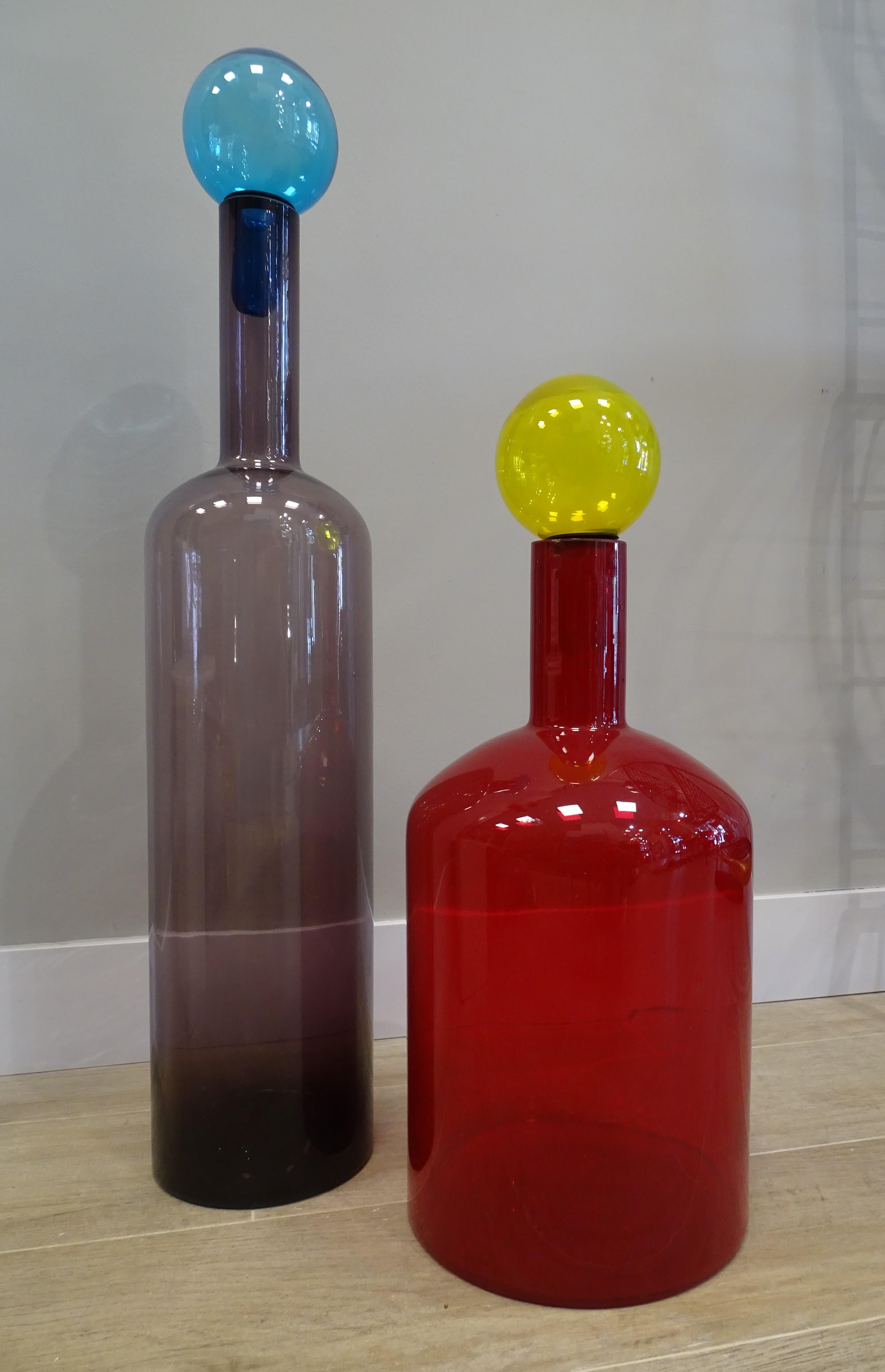 Beautiful , Colorful glass and great bottles made by hand, from the Dutch trendy house Polspotten after Murano glass 60 s design. Their stylized shape and cheerful colors make them the key pieces of your decoration. You can change the cap of the