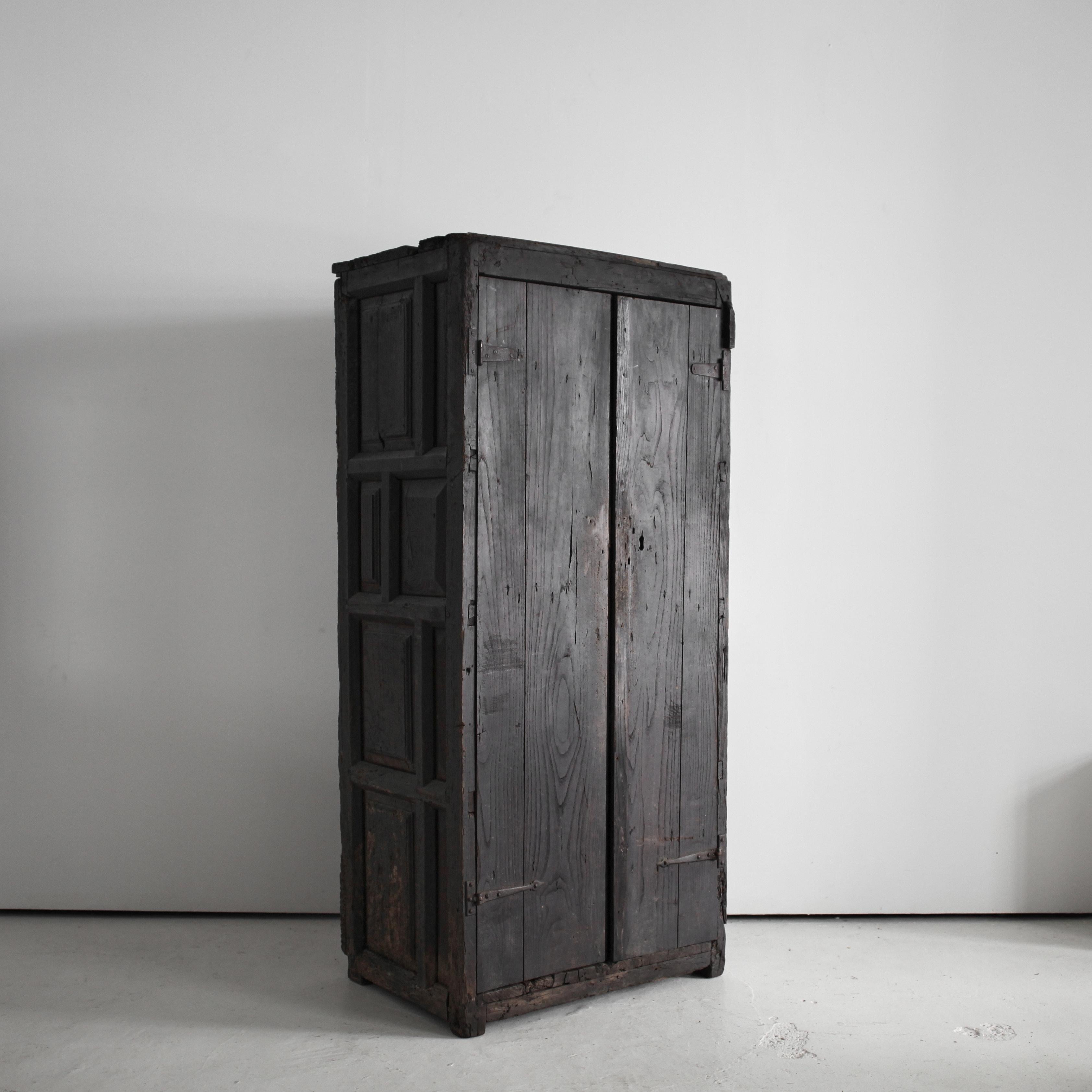 XXL 17th C. Portuguese Mountain Cupboard In Blackened Chestnut

An  ancient XXL cupboard from the mountains of Northern Portugal.

Heavily patinated chestnut with many age old repairs.

Complete with two interior shelves & working lock and