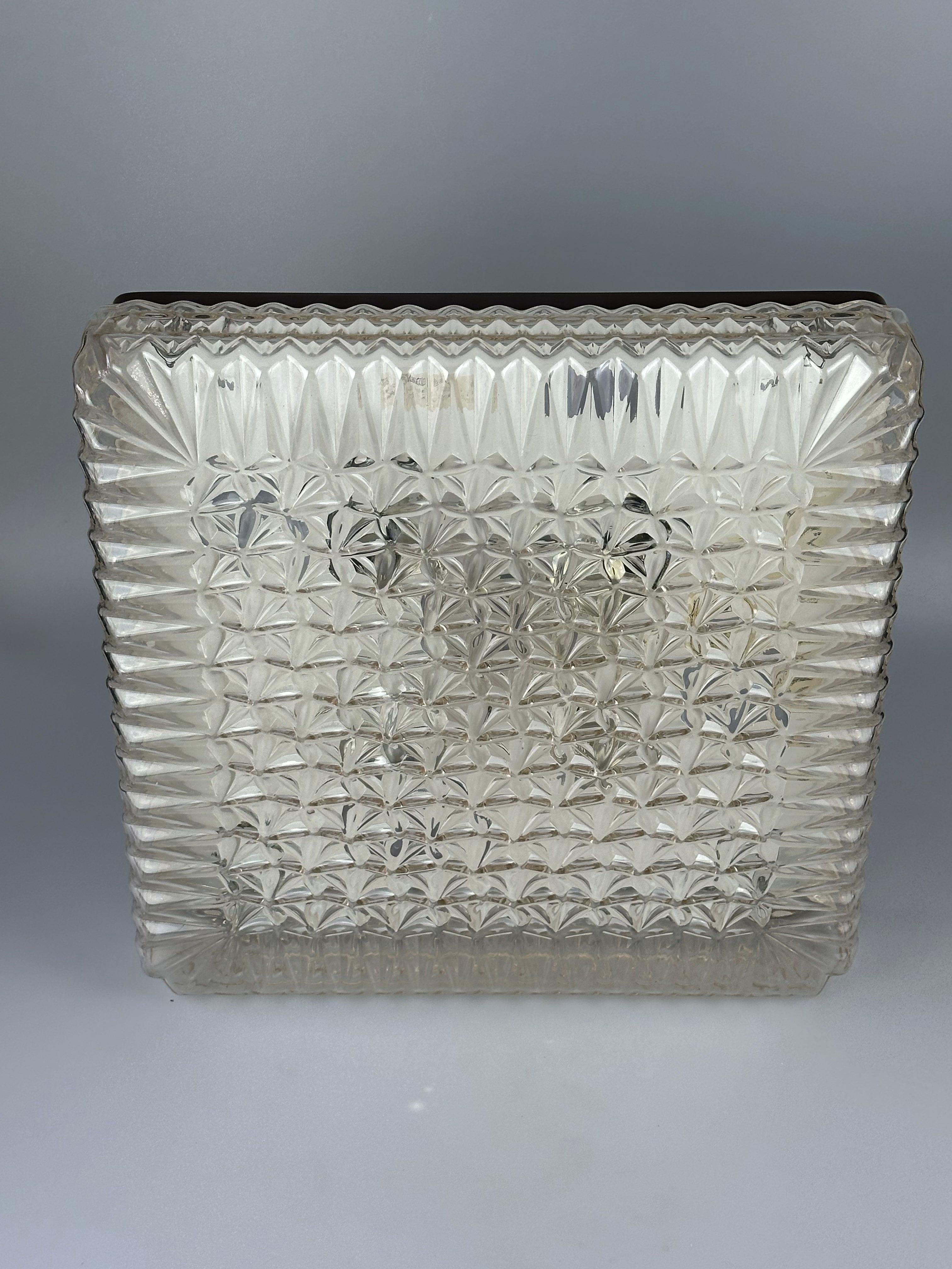XXL 1960s/70s Plastic Ceiling Lamp by Ridi Leuchten Germany

Object: Ceiling Lamp

Manufacturer: Ridi Leuchten

Condition: Good - Vintage

Age: Around 1960-1970

Dimensions:

Width = 46cm
Depth = 46cm
Height = 11.5cm

Other Information:

4x E27