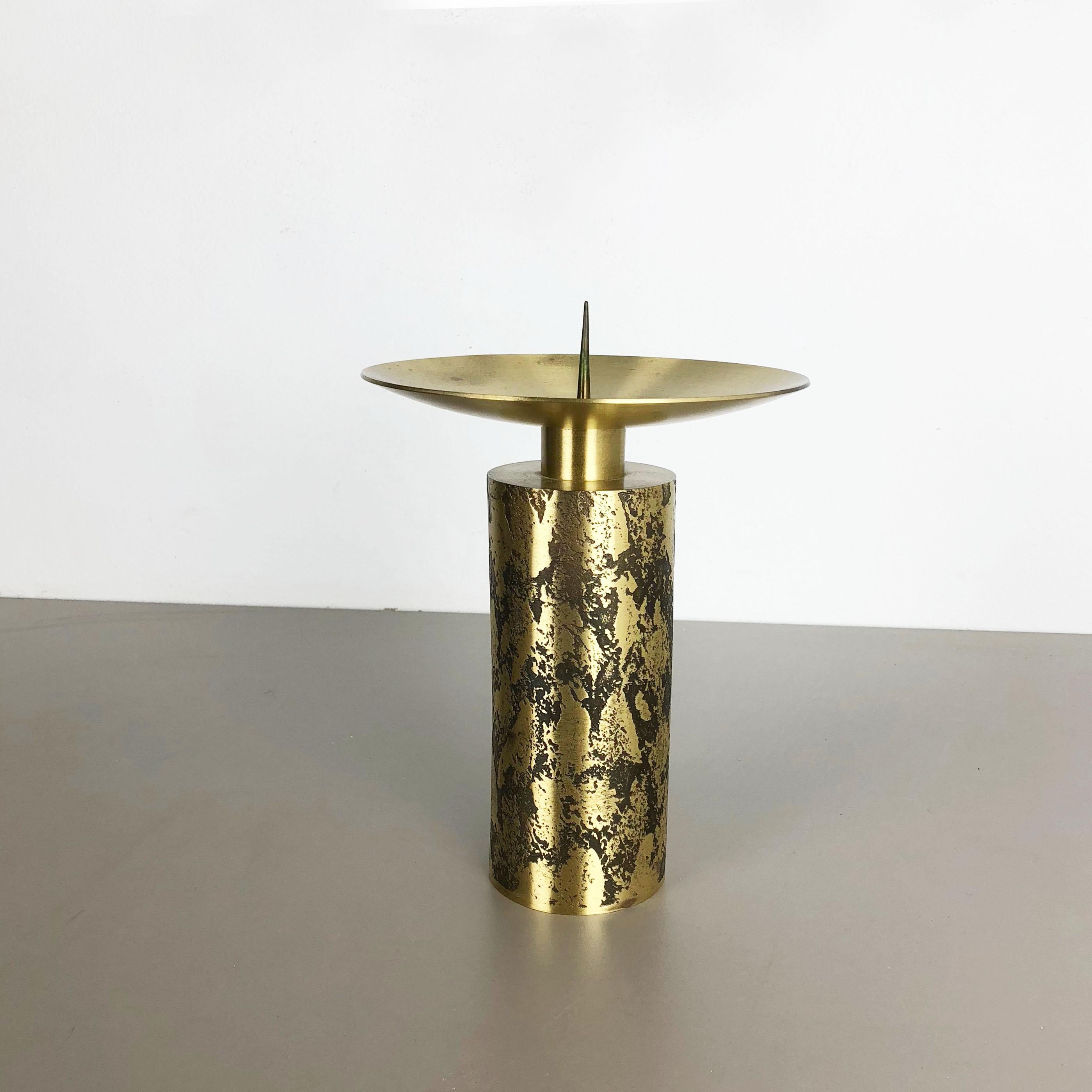 Article:

Brutalist candleholder


Origin:

Germany


Material:

metal


Decade:

1970s


Description:

this original vintage candleholder, was produced in the 1970s in Germany. it is made of solid metal in golden brass tone finish, and has a lovely