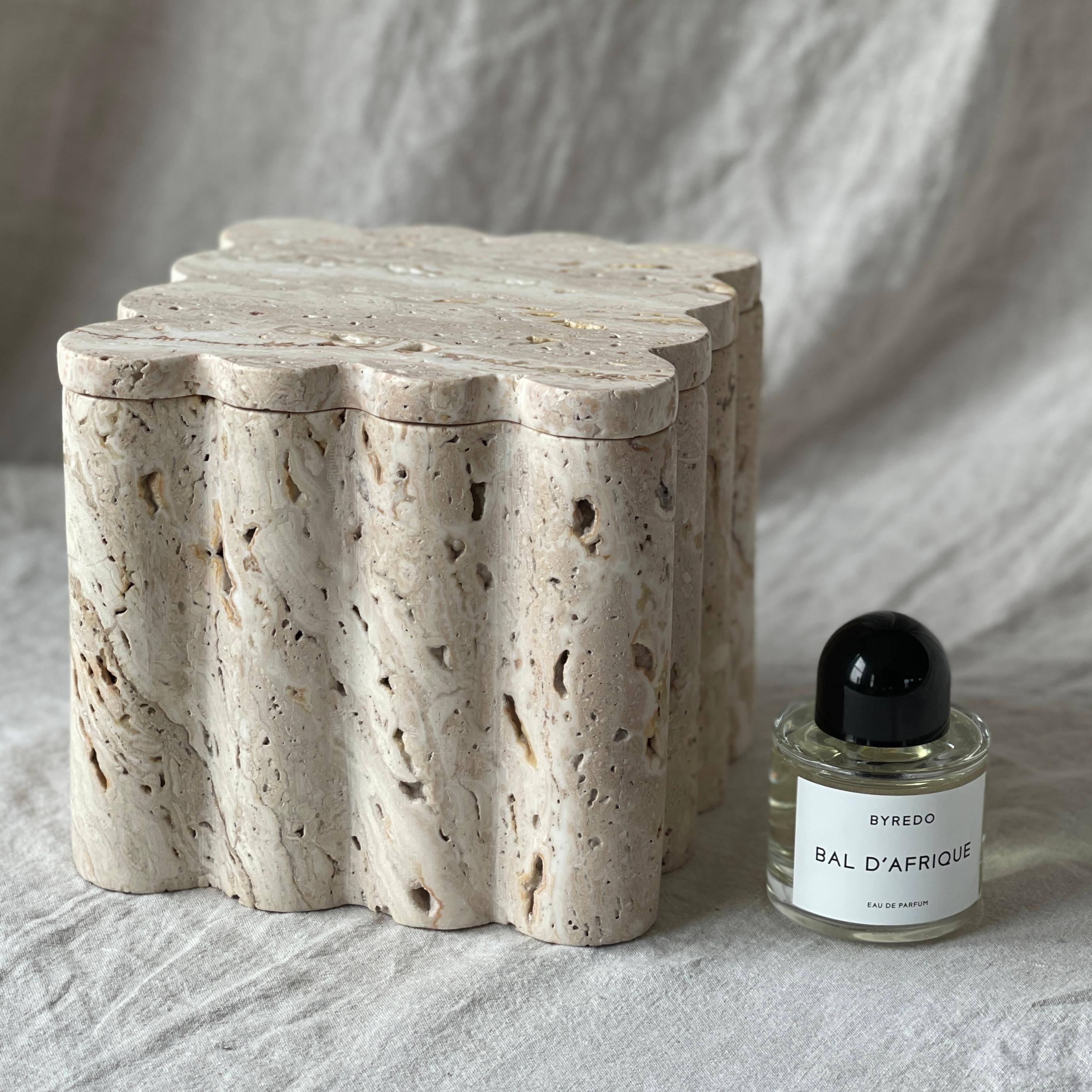 XXL Box is a limited edition functional object d'art carved from a single cube of Travertine.  Hand-finished by a growing artisan atelier in Rajasthan, India it is produced exclusively by Anastasio Home. This lidded box is a jumbo version of the