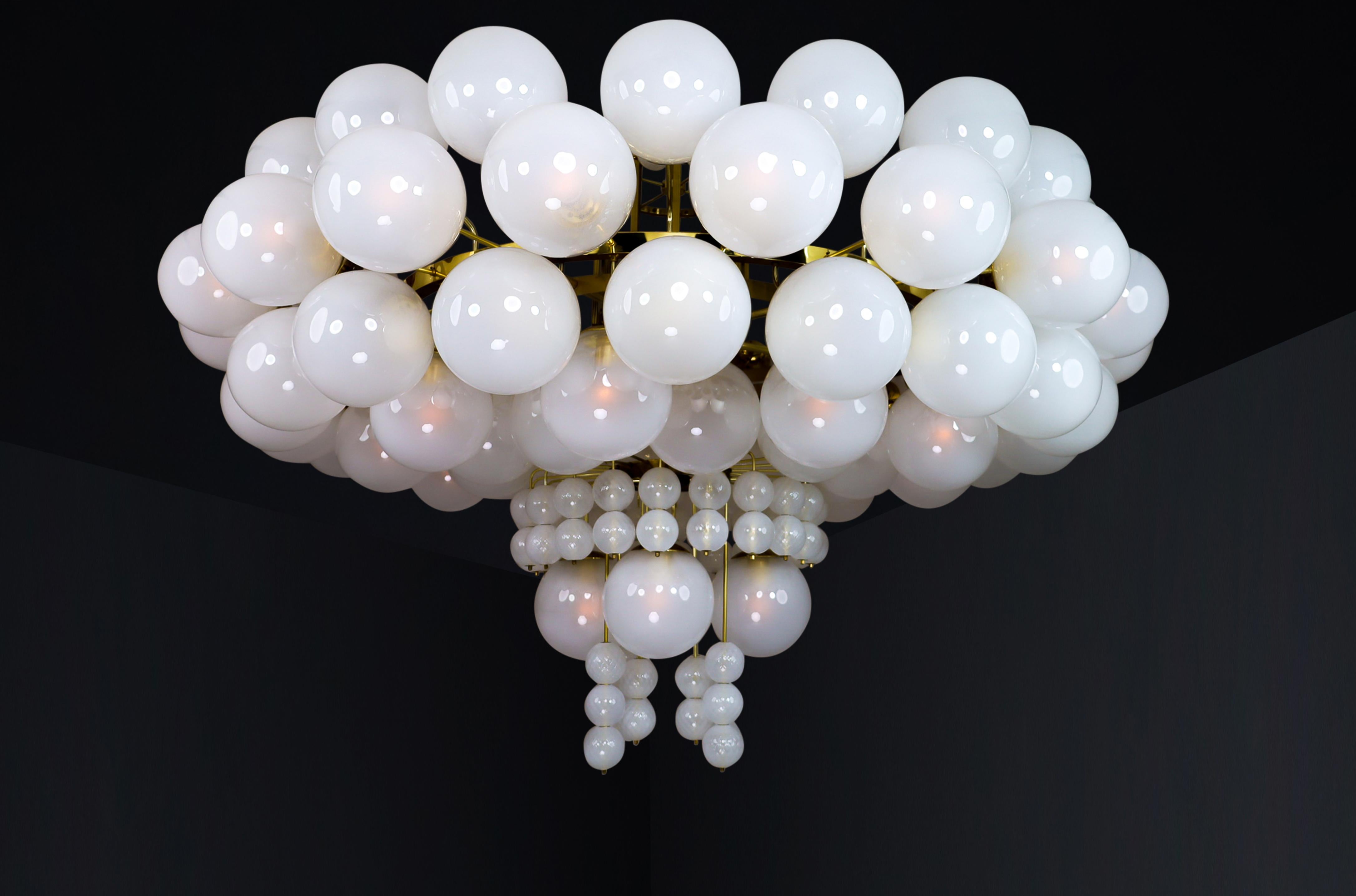 Mid-Century Modern XXL Hotel Chandelier with Brass Fixture and Hand-Blowed Frosted Glass Globes For Sale