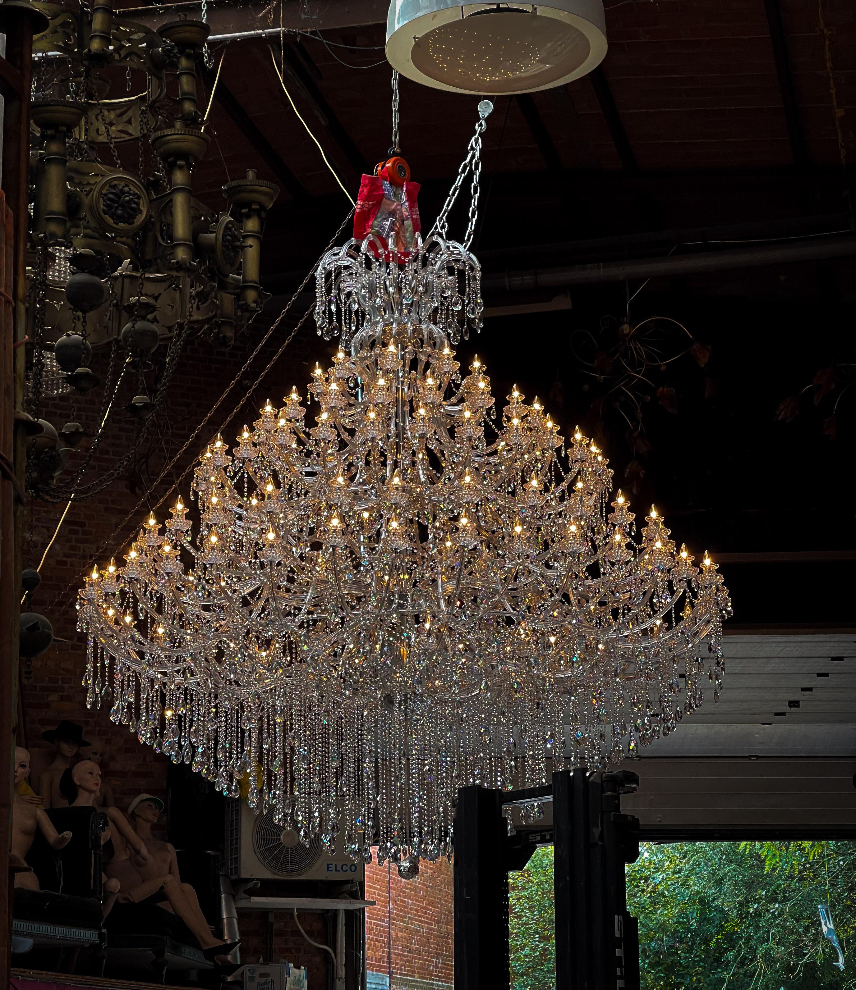 Presenting an extraordinary XXL Marie Therese chandelier, an awe-inspiring masterpiece spanning an impressive 3 by 3 meters. The sheer size of this piece sets it apart, making it an absolute showstopper for any space. Whether gracing a commercial