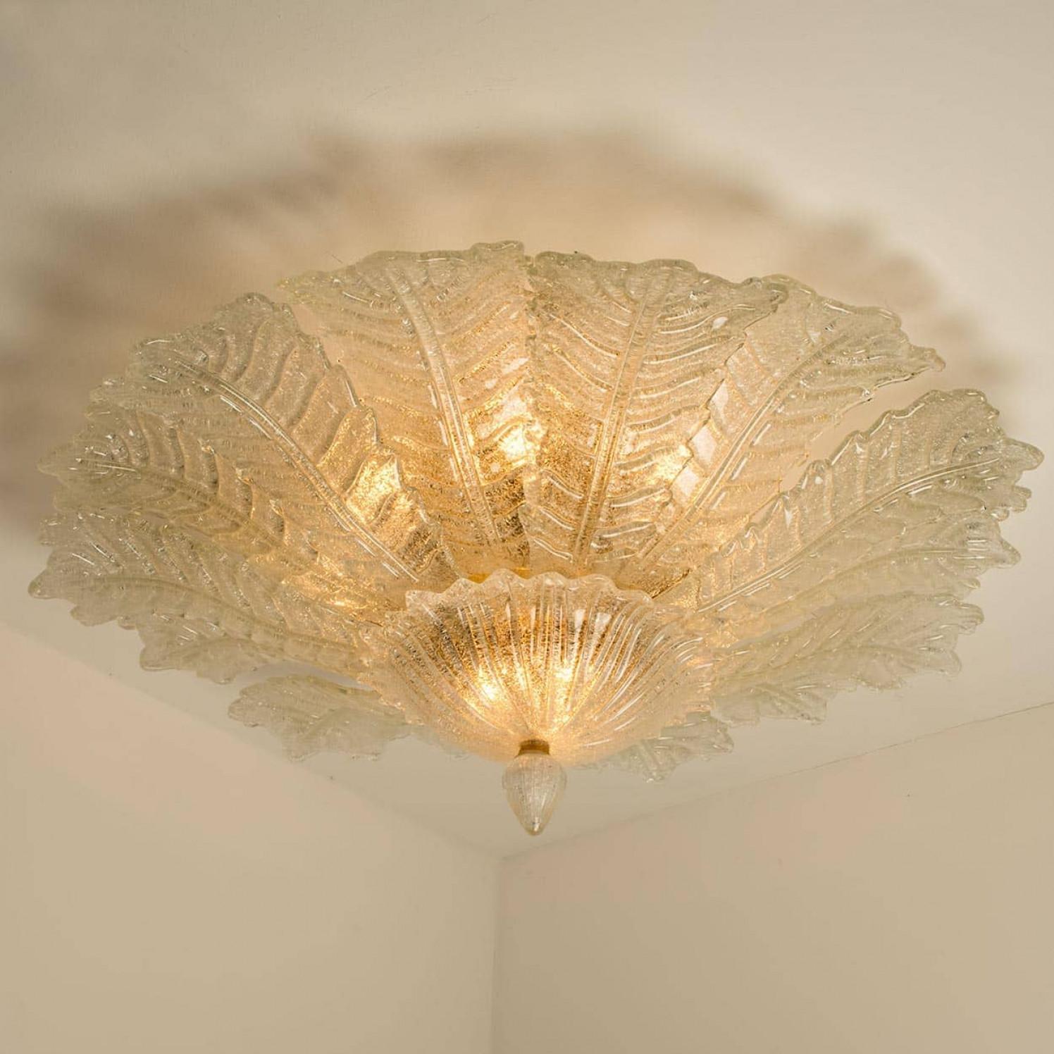 Splendid  Extra Large Size Murano glass ceiling lamp in colored glass bead with transparant clear glass. The rich texture creates a beautiful glow.

Manufactured around 1970. A real statement piece that fits in many different interiors. Illuminates
