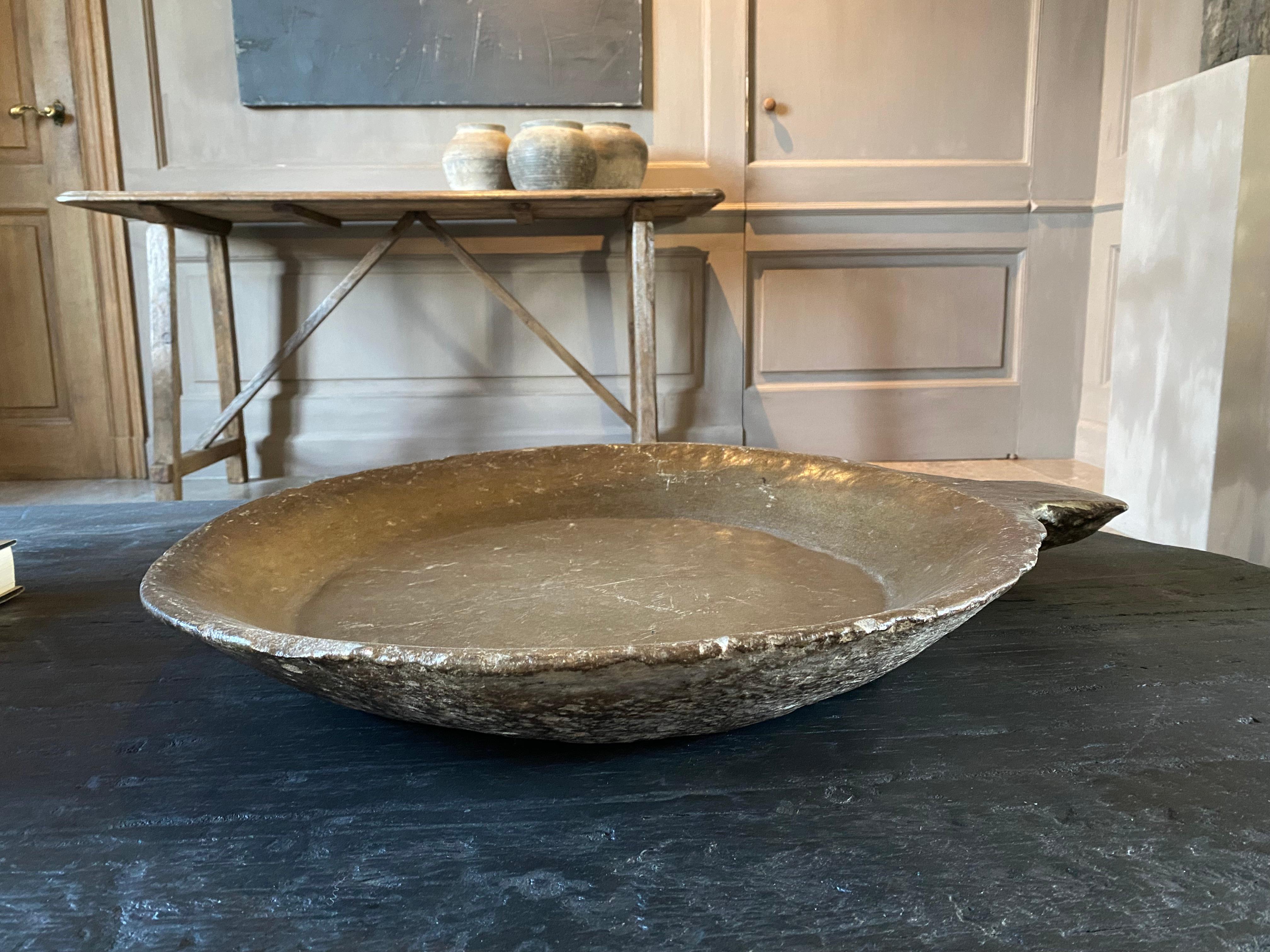 Impressive bowl from the transition period, which has been used endlessly in sieving, to collect material. Nepalese utensil.
Beautiful soft color shades.
Very large size and unique in its kind. (72 cm dia)


We ship safely worldwide with insurance.
​