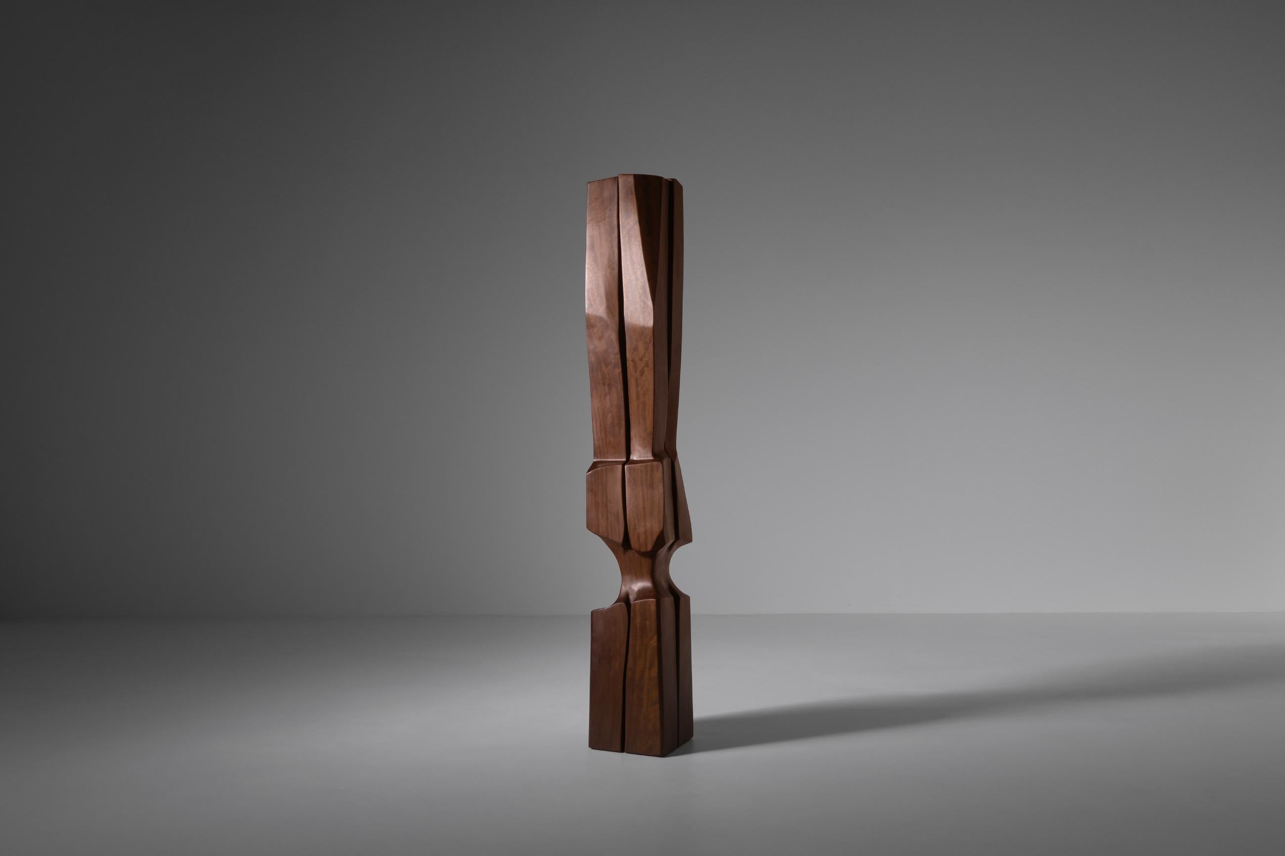 XL abstract wooden sculpture, the Netherlands 1981. Beautiful hand-carved organic shape out of one piece of solid Iroko wood which strengthen its 'native' chracter. Signed at the bottom. The sculpture is in an excellent original condition.