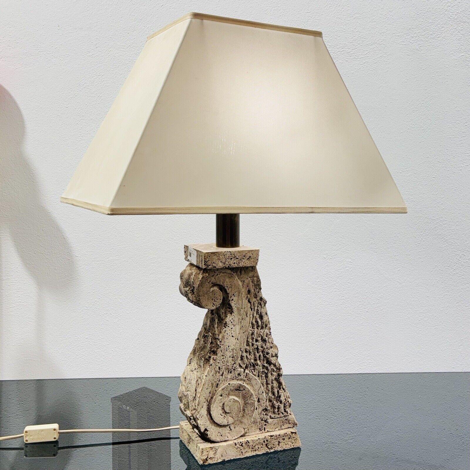 1970S - WONDERFUL AND IMPRESSIVE HOLLYWOOD REGENCY TRAVERTINE AND BRASS TABLE LAMP.

FABRIC LAMPSHADE.

THE ITEM IS IN EXCELLENT CONSERVATIVE CONDITION, THERE IS NO COSMETIC OR STRUCTURAL DEFECT TO REPORT, ONLY SLIGHT AND OBVIOUS SIGNS OF AGING.