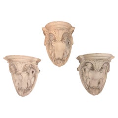 Vintage XXth century group of three terracotta shelves