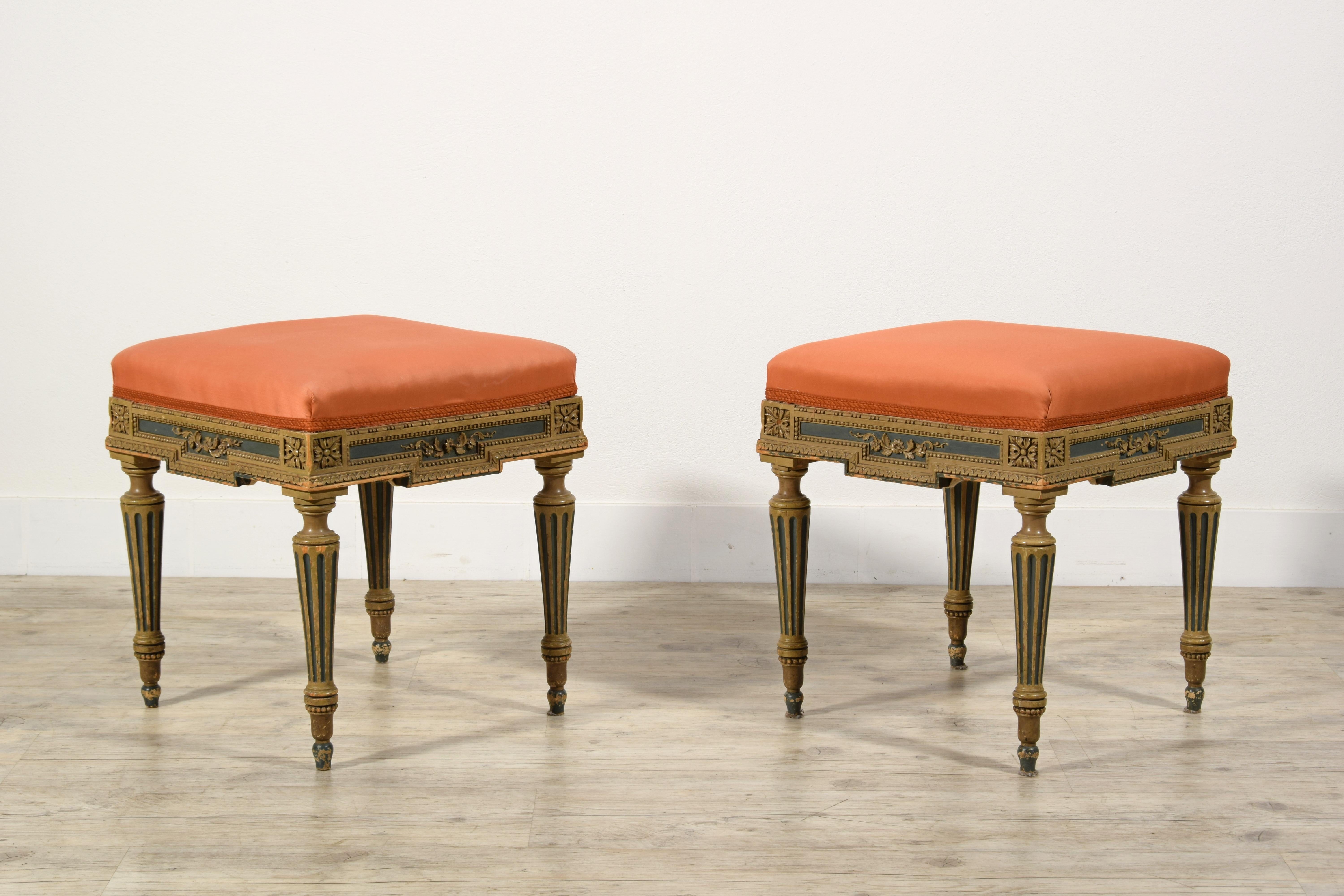 This gorgeous pair of stools was made in Piedmont (northern Italy) in the early twentieth century in Neoclassical style. Their structure is in carved wood and lacquered in shades of ochre and blue, characteristic of the construction area.
The band