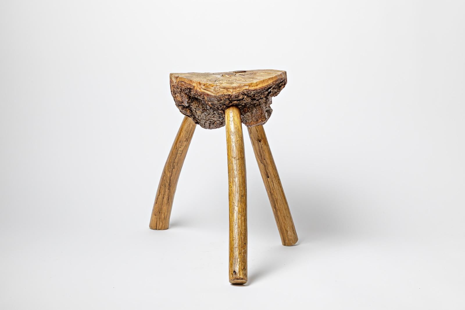 French XXth century wood stool center of France circa 1950 traditional design For Sale