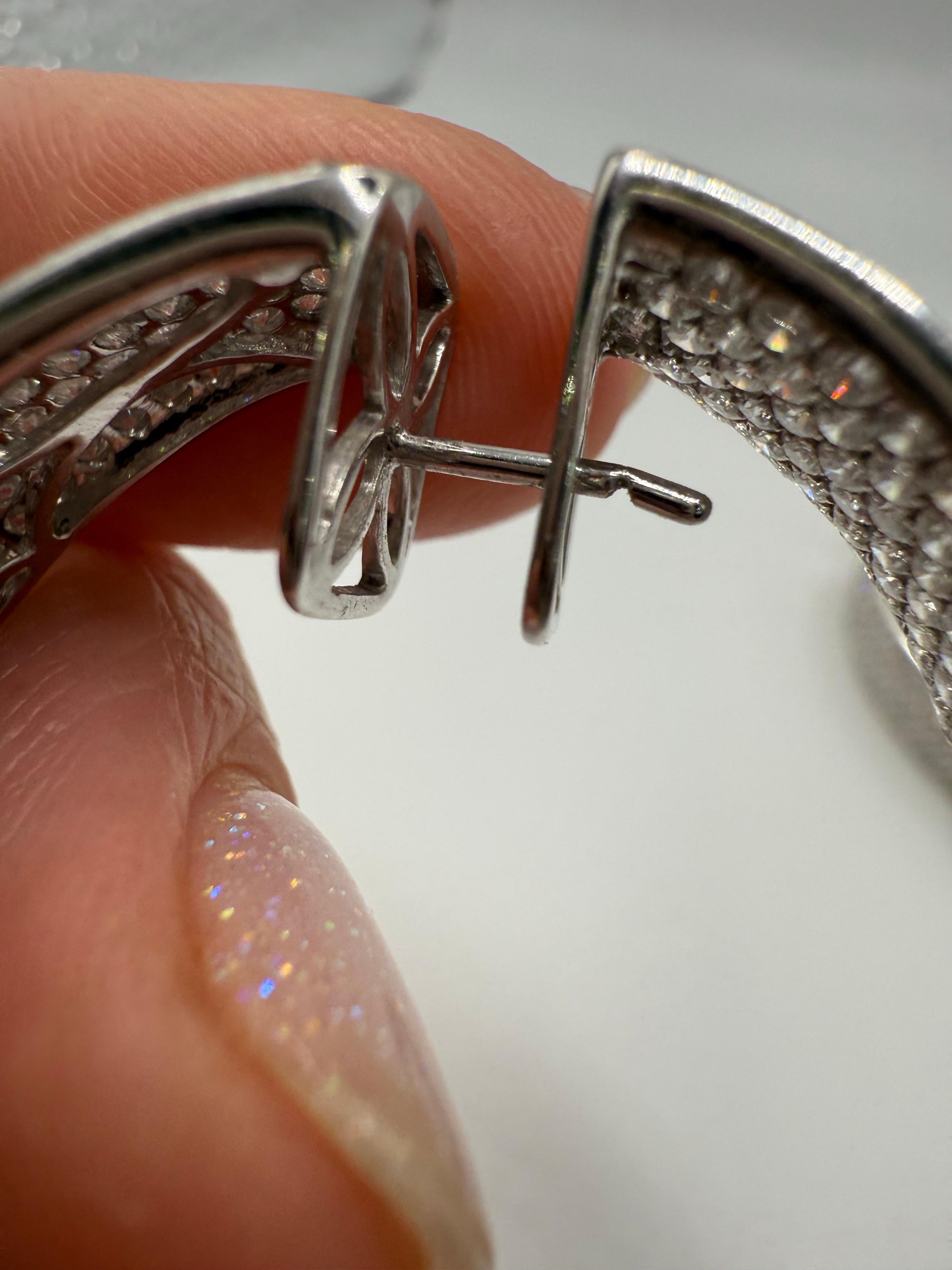 These are incredible, rare and hard to find and even hard to make because they are made to perfections with hundreds of stones in pave setting. These are so comfortable on ears and they sparkle like no other!  Diamonds are totaling 22 carats VS-SI