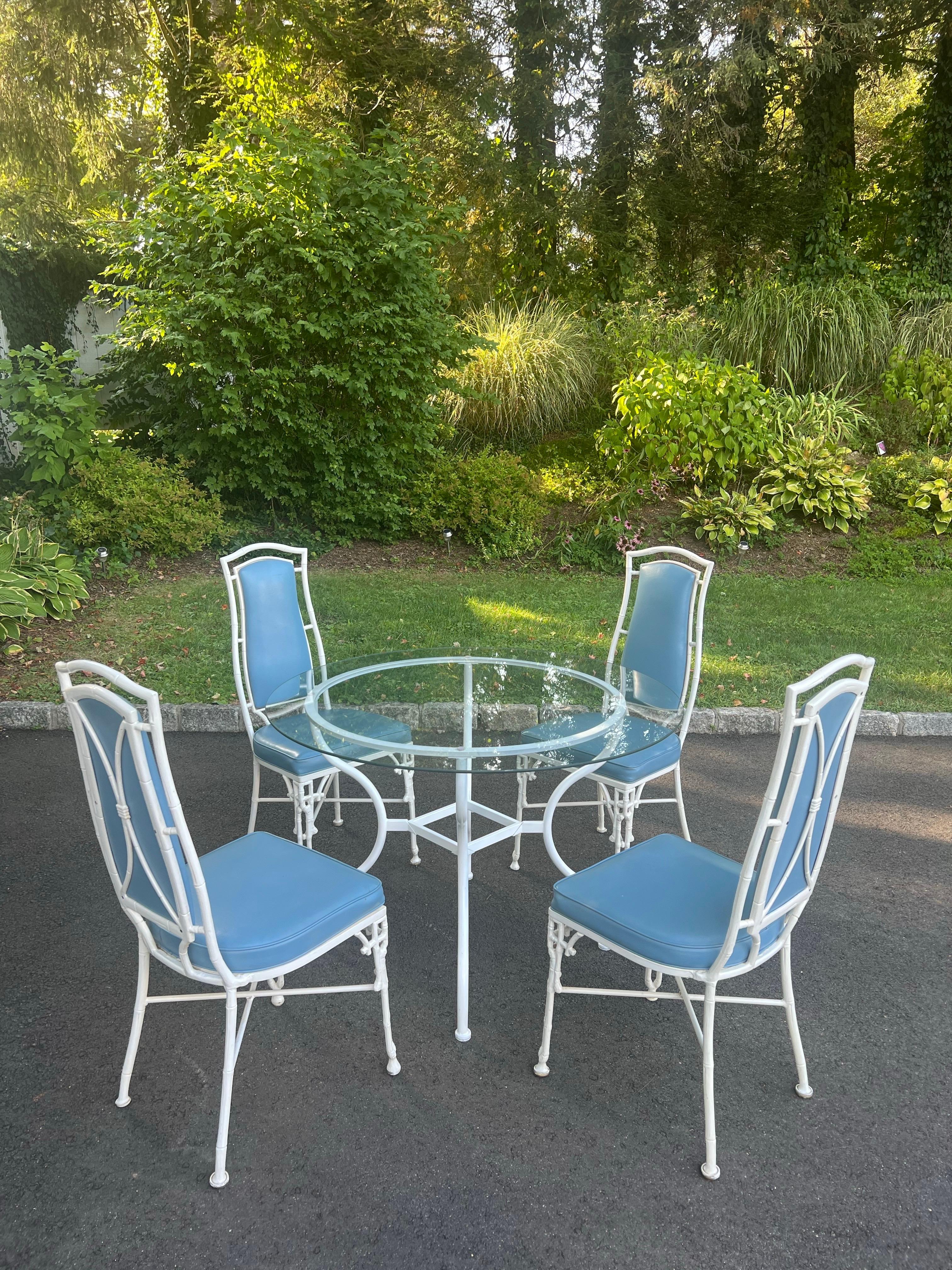 Chinese Chippendale Bamboo Patio Set by Kessler.  Fabulous high back Wedgewood blue vinyl seats with Chinese Chippendale white iron chairs . Perfect for that decorator look . Best if used in an enclosed patio or as a kitchen table set . Palm Beach