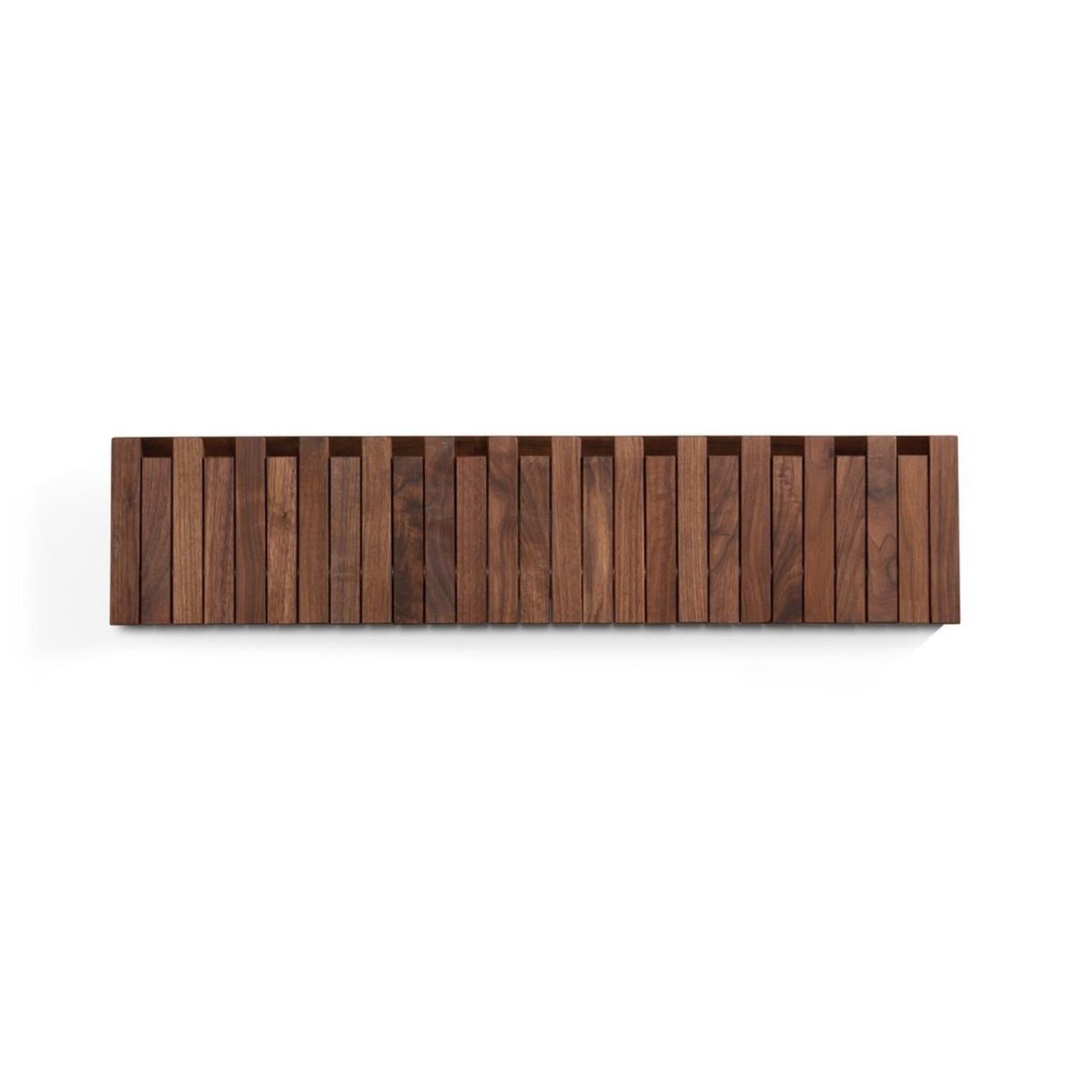 Xylo coat rack by Patrick Séha
Dimensions: 81 x H 20 cm
Materials: Walnut natural oiled

Available in various wood finishes

The XYLO is a wall-mounted coat rack with foldable hooks, inspired by the PIANO hanger panel designed by Patrick Seha