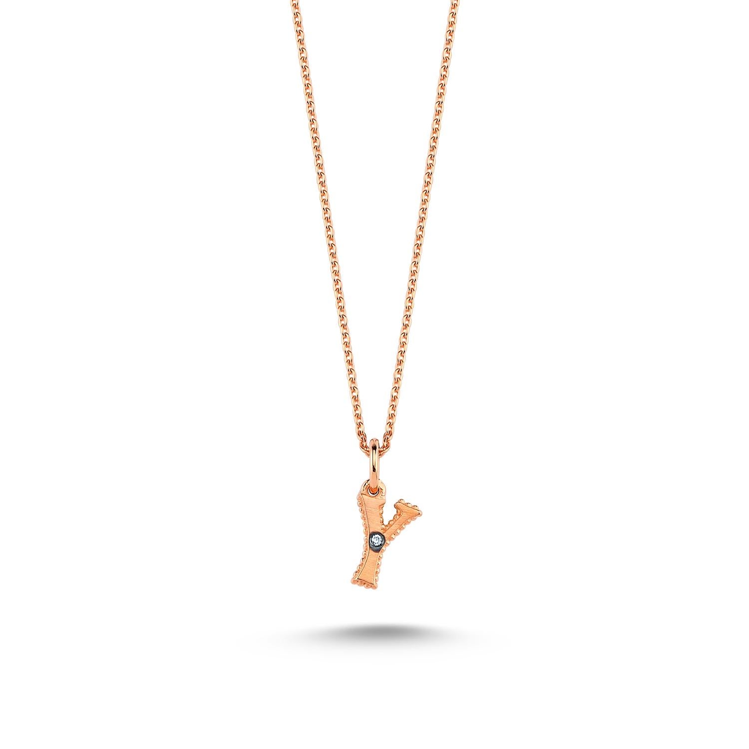 Y 14k rose gold small necklace with white diamond by Selda Jewellery

Additional Information:-
Collection: Letter Collection
14k Rose gold
0.01ct White diamond
Pendant height 0.7cm
Chain length 44cm