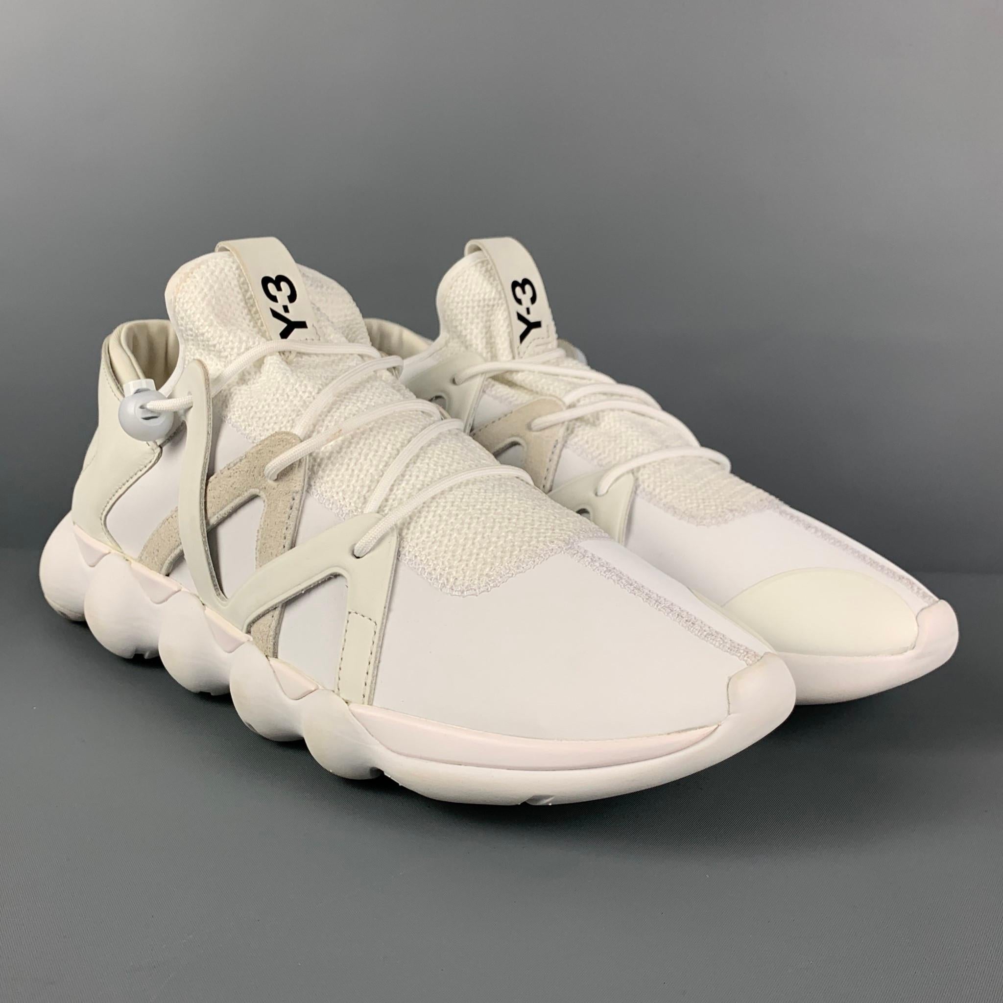 Y-3 by YOHJI YAMAMOTO 'Kyujo Low' sneakers comes in a white mixed fabrics with a suede trim featuring a rubber sole and a adjustable lace closure. 

Very Good Pre-Owned Condition. Minor wear.
Marked: 12.5
Original Retail Price: $295.00

Outsole: 13