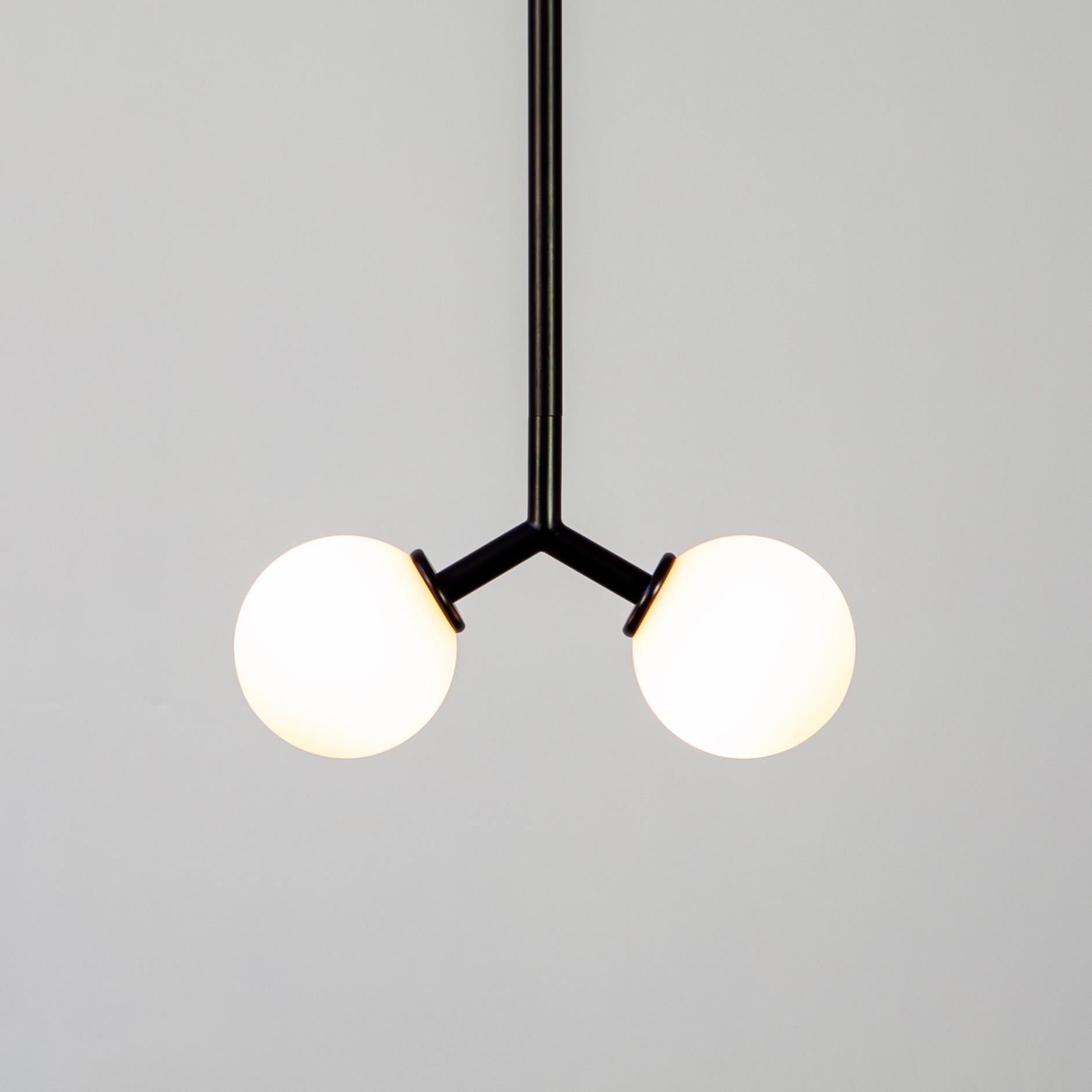 This listing is for 1x Y Mini Pendant Light designed and manufactured by Research.Lighting. 

Materials: Steel, Glass
Finish: Powder Coated Steel in black
Electronics: 2x G9 Sockets, 2x 4.5 Watt LED Bulbs (included), 900 total Lumens
UL Listed. Made