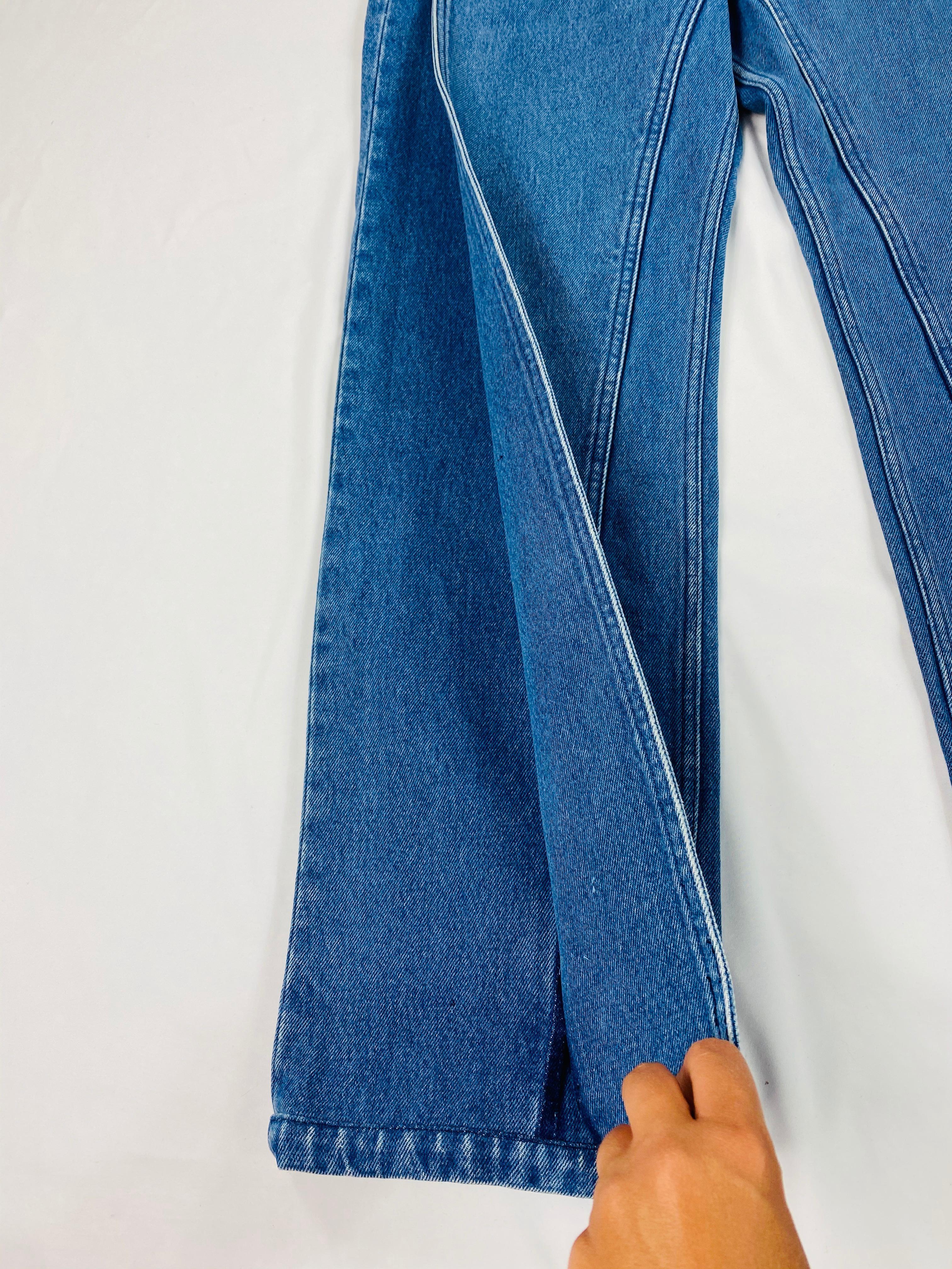 product details:

Featuring blue stonewash denim pants with straight fit and full length. Double layered front leg extending the pocket down to the hemline. Extended rear pocket stitching down rear leg. 
Made in France.
