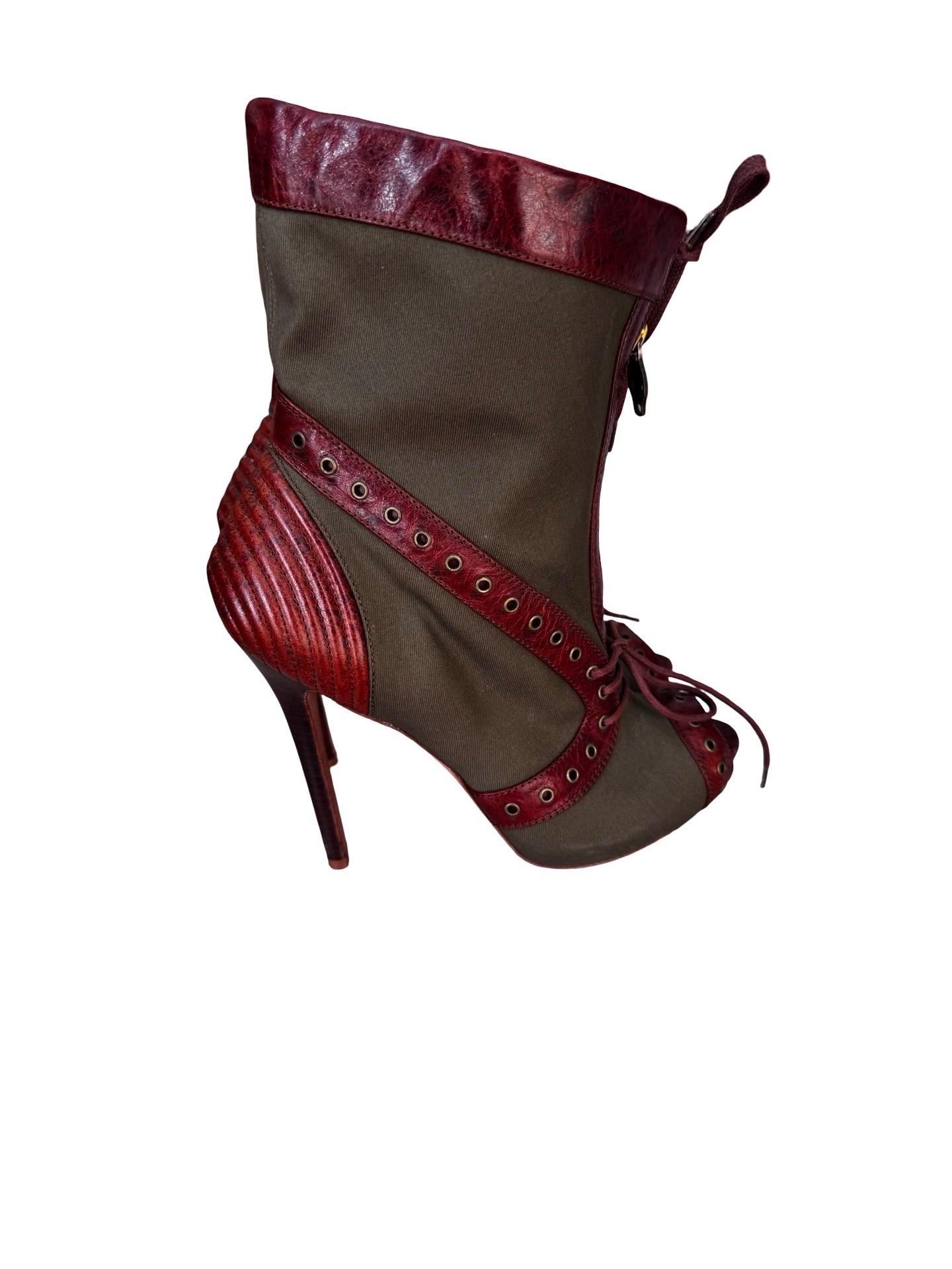 Y2K Alexander McQueen ankle/calf booties with an open toe.  Distressed brown leather with grommet detailing and green khaki canvas material.  Slight platform (1/4-1/2 inch) and 4.5