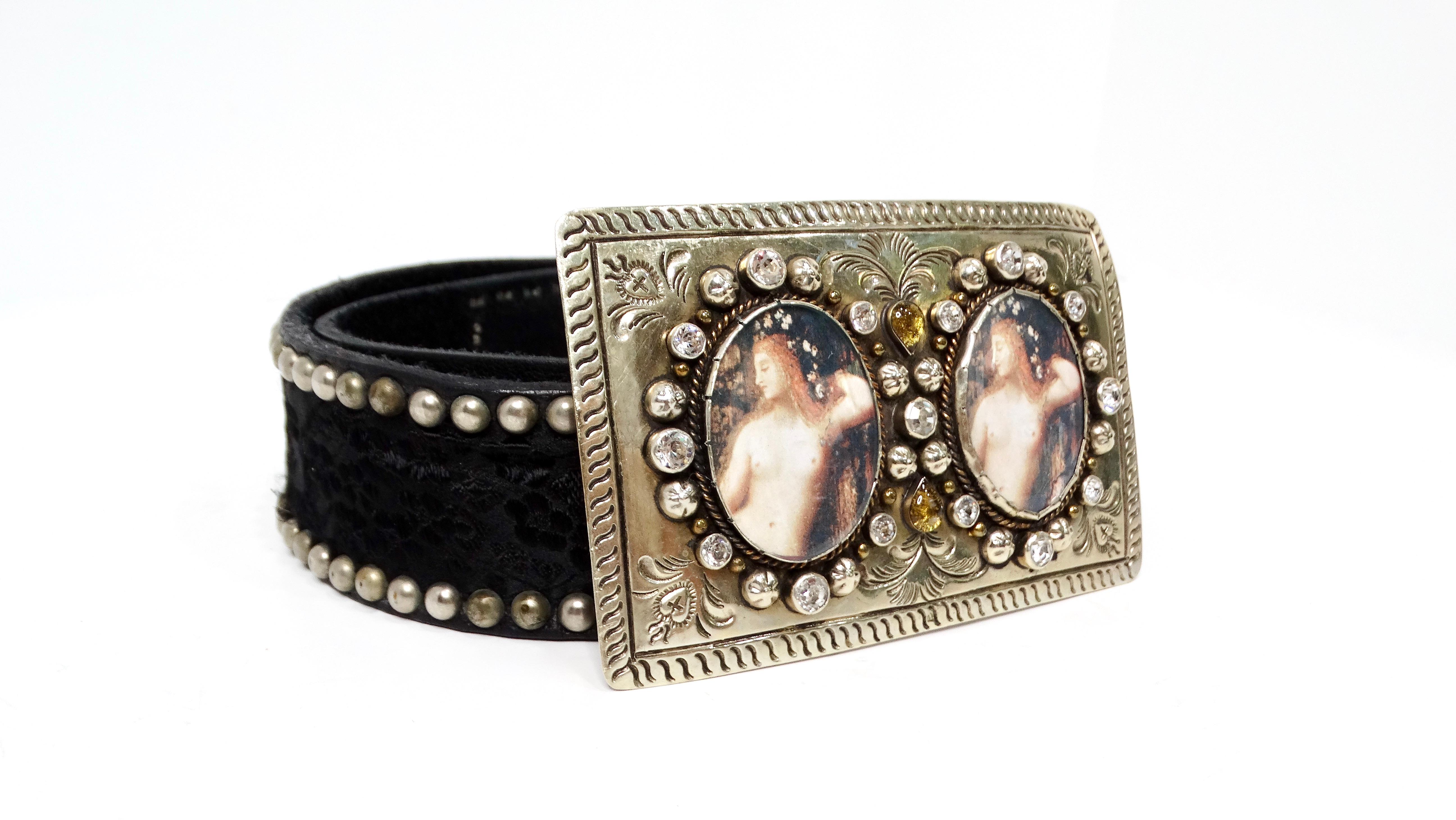 Introducing the Y2K Black Leather & Silk Studded Belt With Renaissance Rhinestone Buckle, a striking accessory that blends modern flair with a touch of vintage elegance. This unique belt features a luxurious black leather base adorned with an